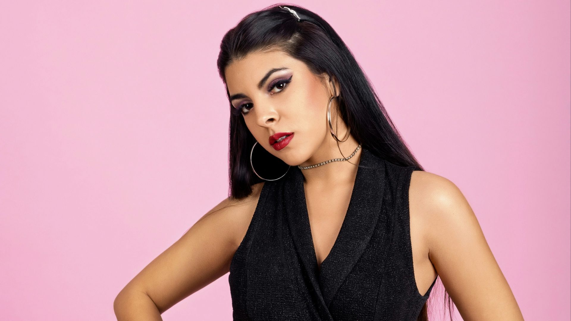 woman in black sleeveless dress