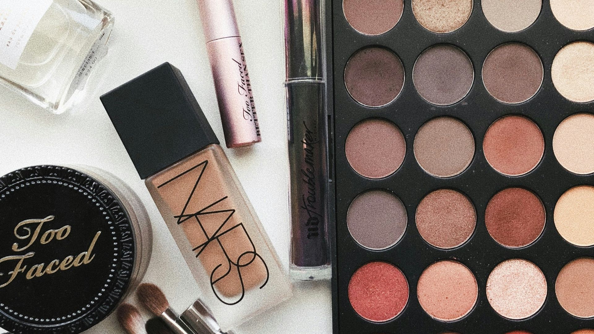 close-up photography of assorted cosmetics