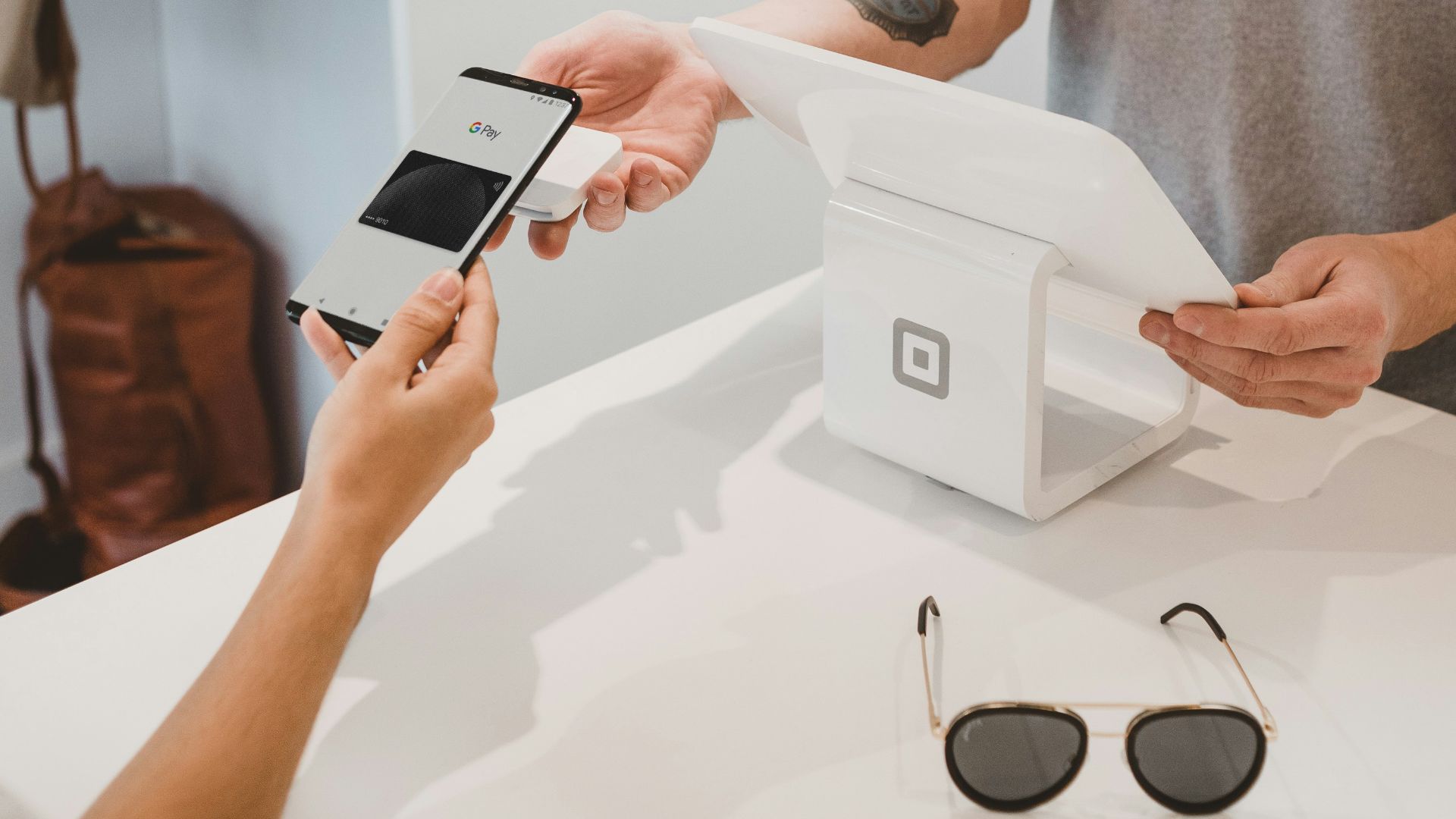 person holding black Android smartphone close-up photography