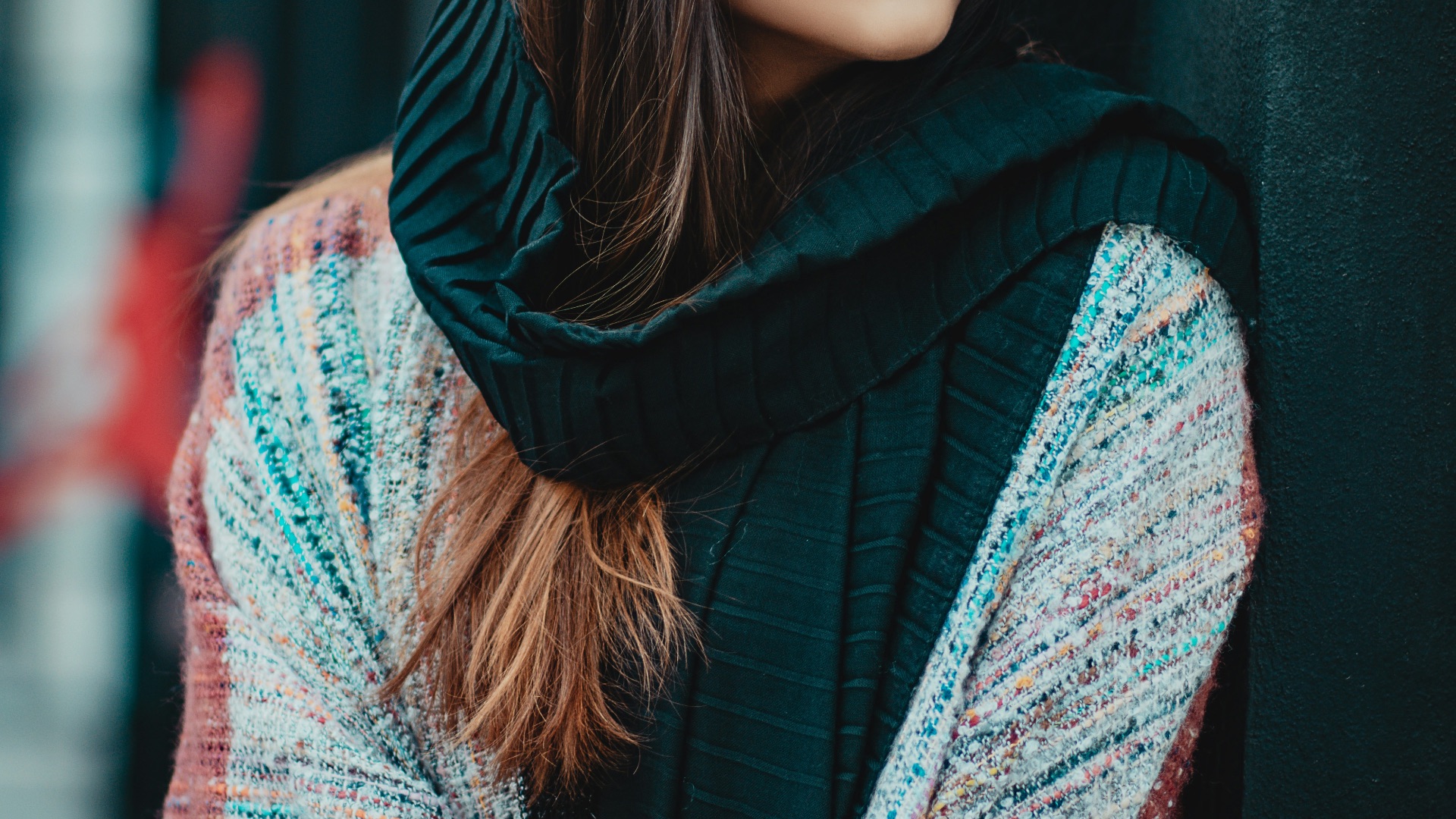 woman in blue and white scarf wearing black framed eyeglasses