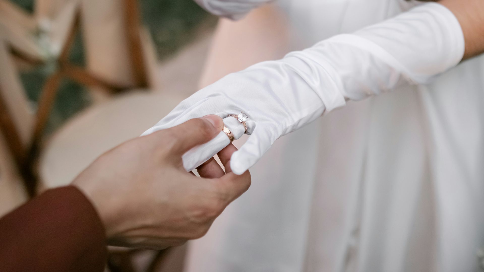 a couple of people that are wearing white gloves