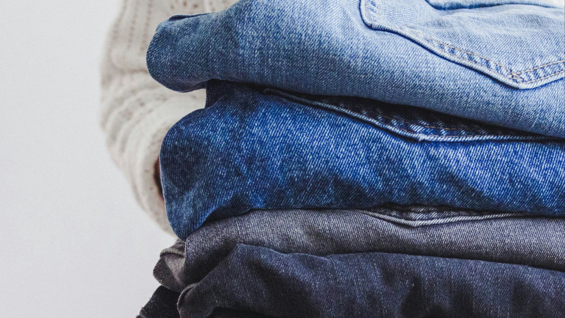 blue and white textile on white textile