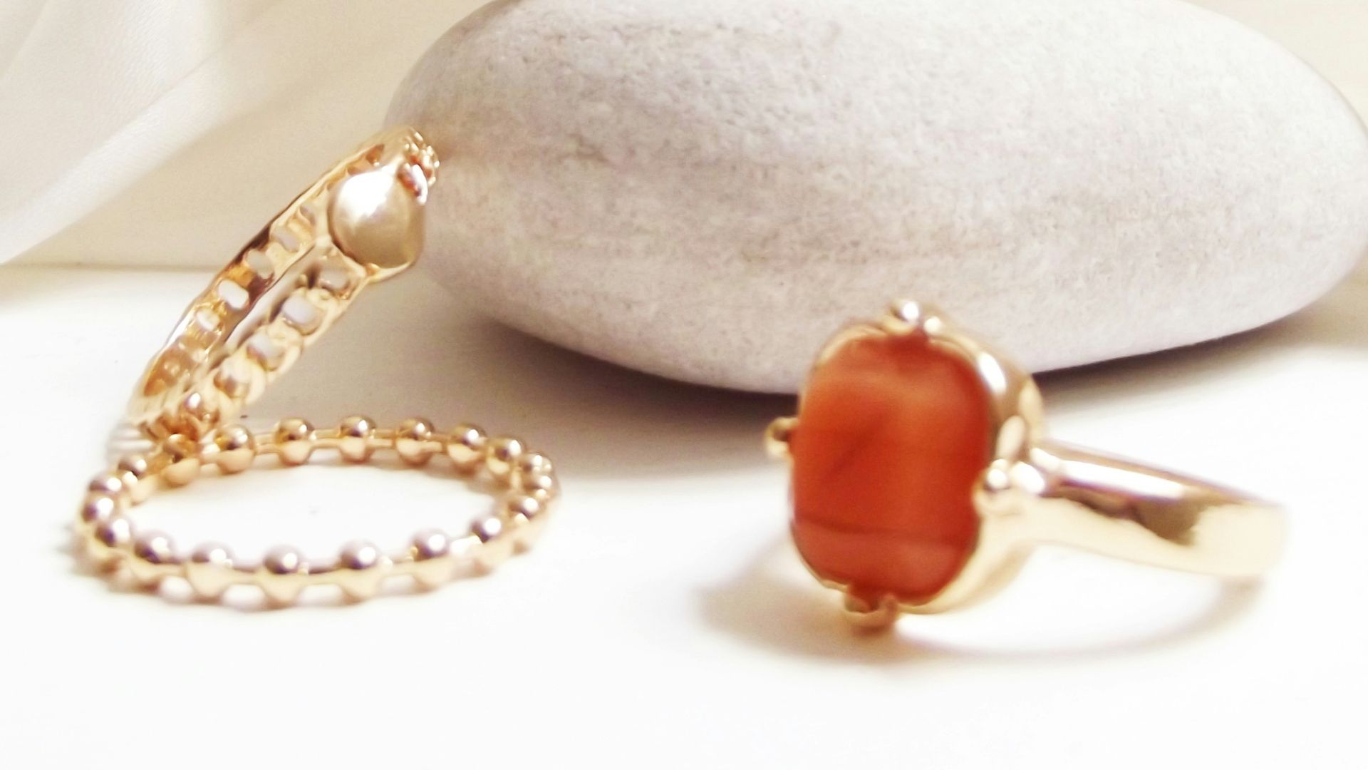 gold and red beaded bracelet