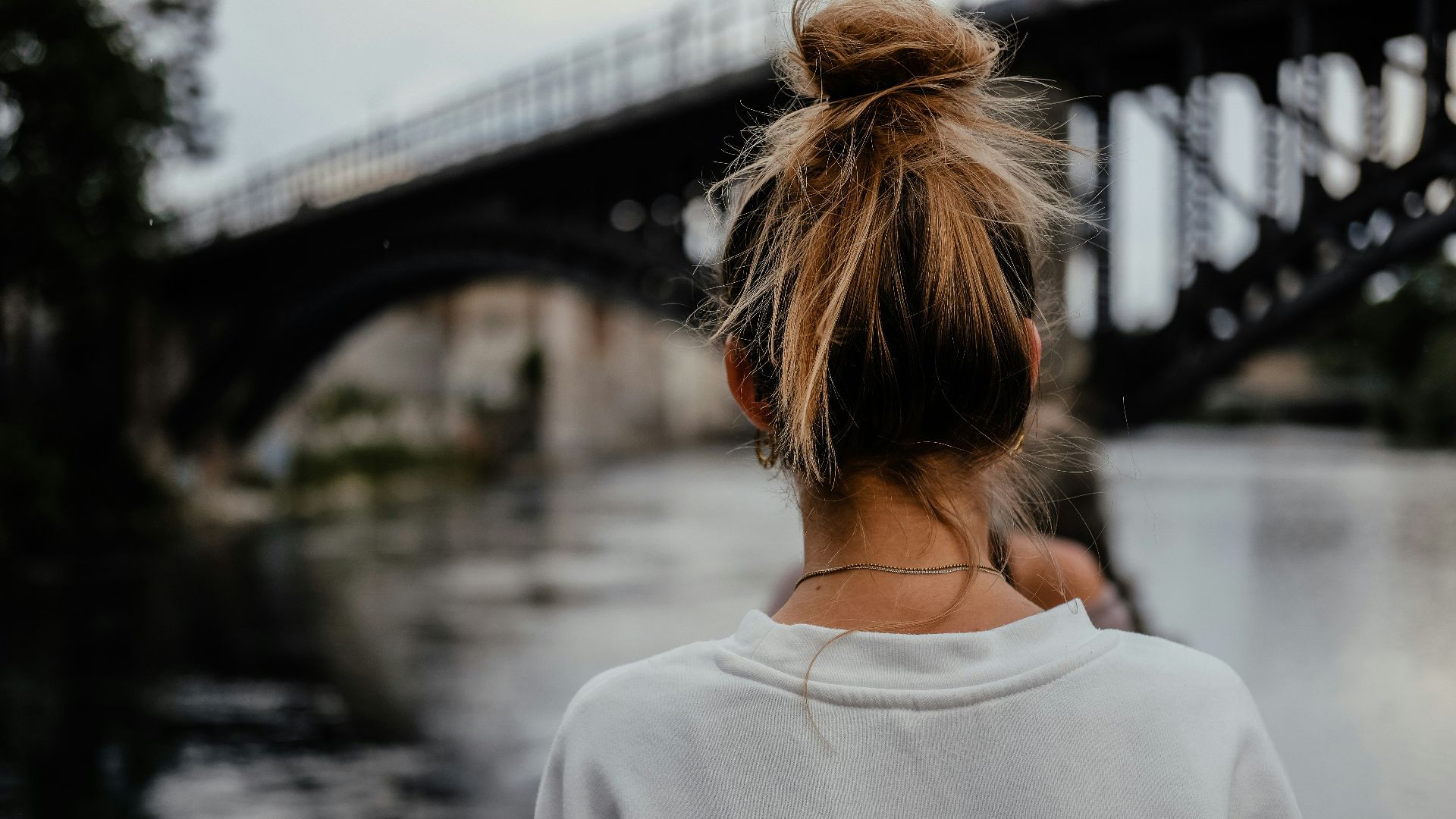 woman sight seeing on bridge