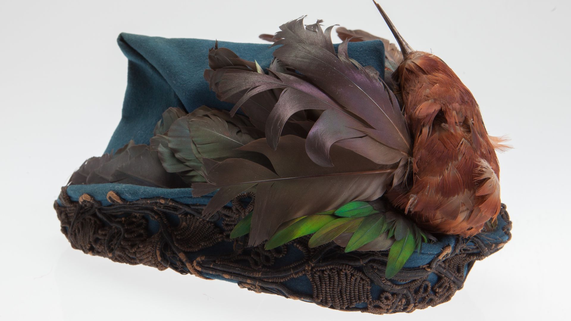 File:Woman's Blue Robin Hood Hat With Bird.jpg