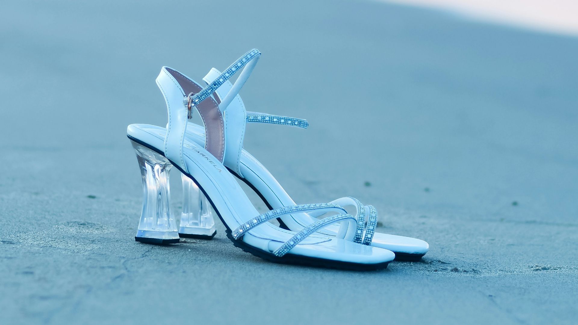 a small model airplane on a beach