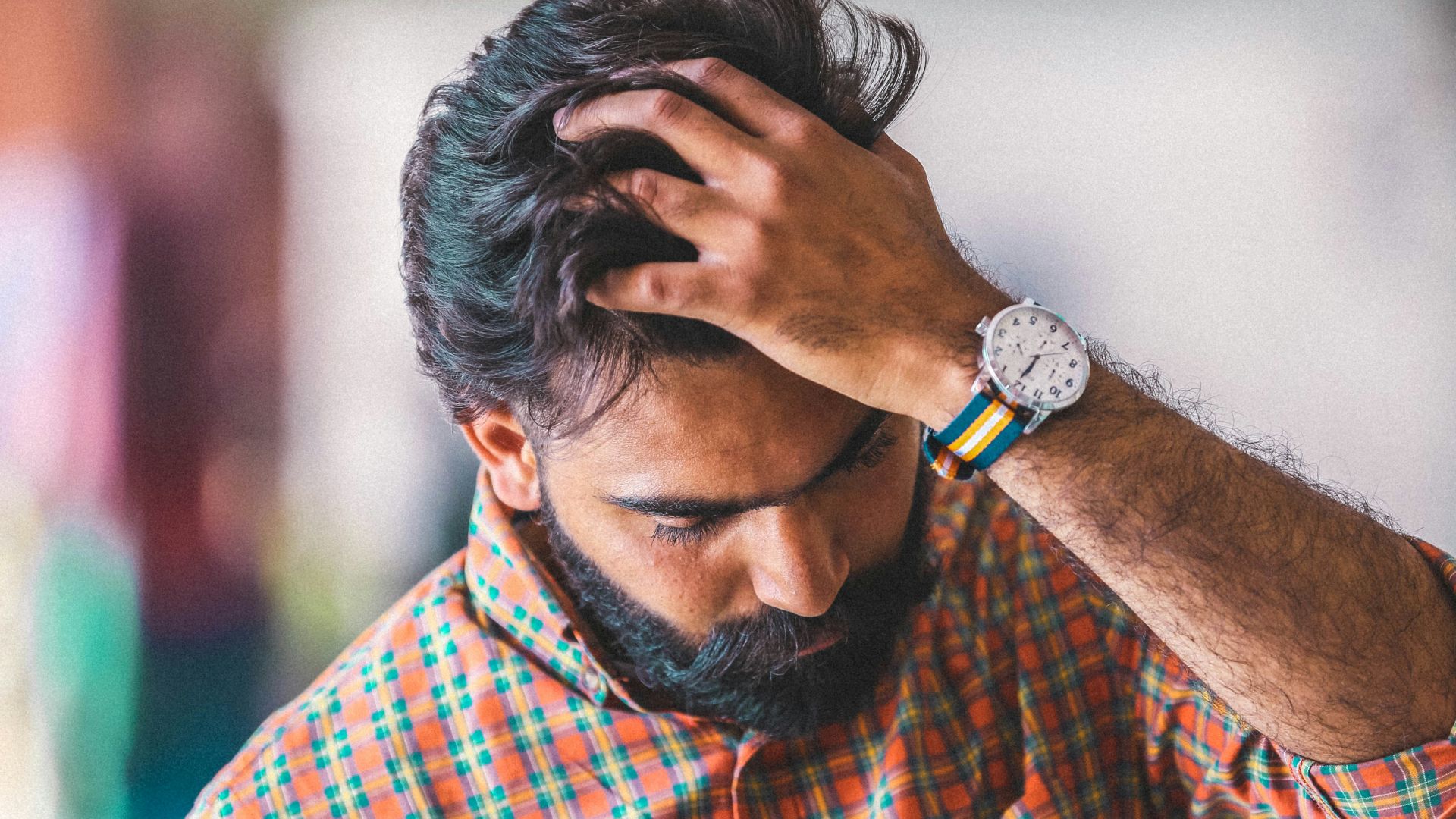 men's green, orange, and black plaid sports shirt