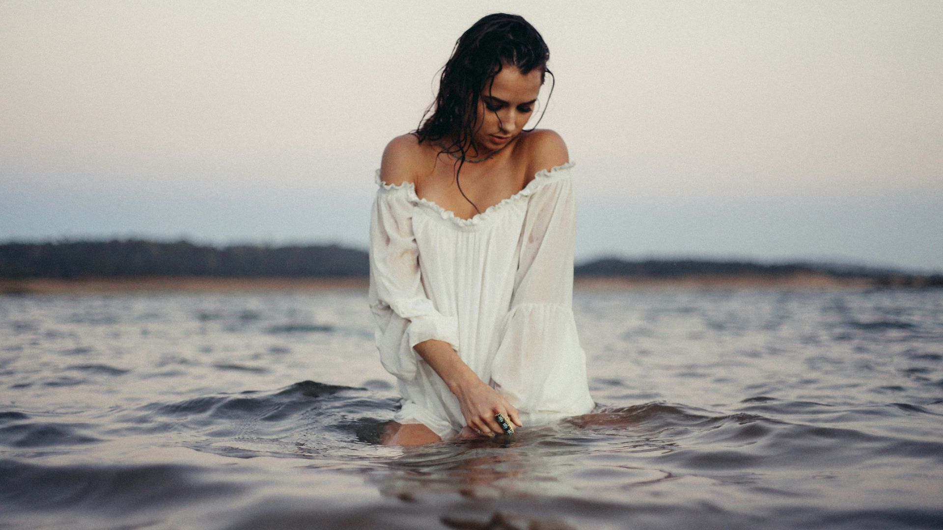 woman posing in body of water