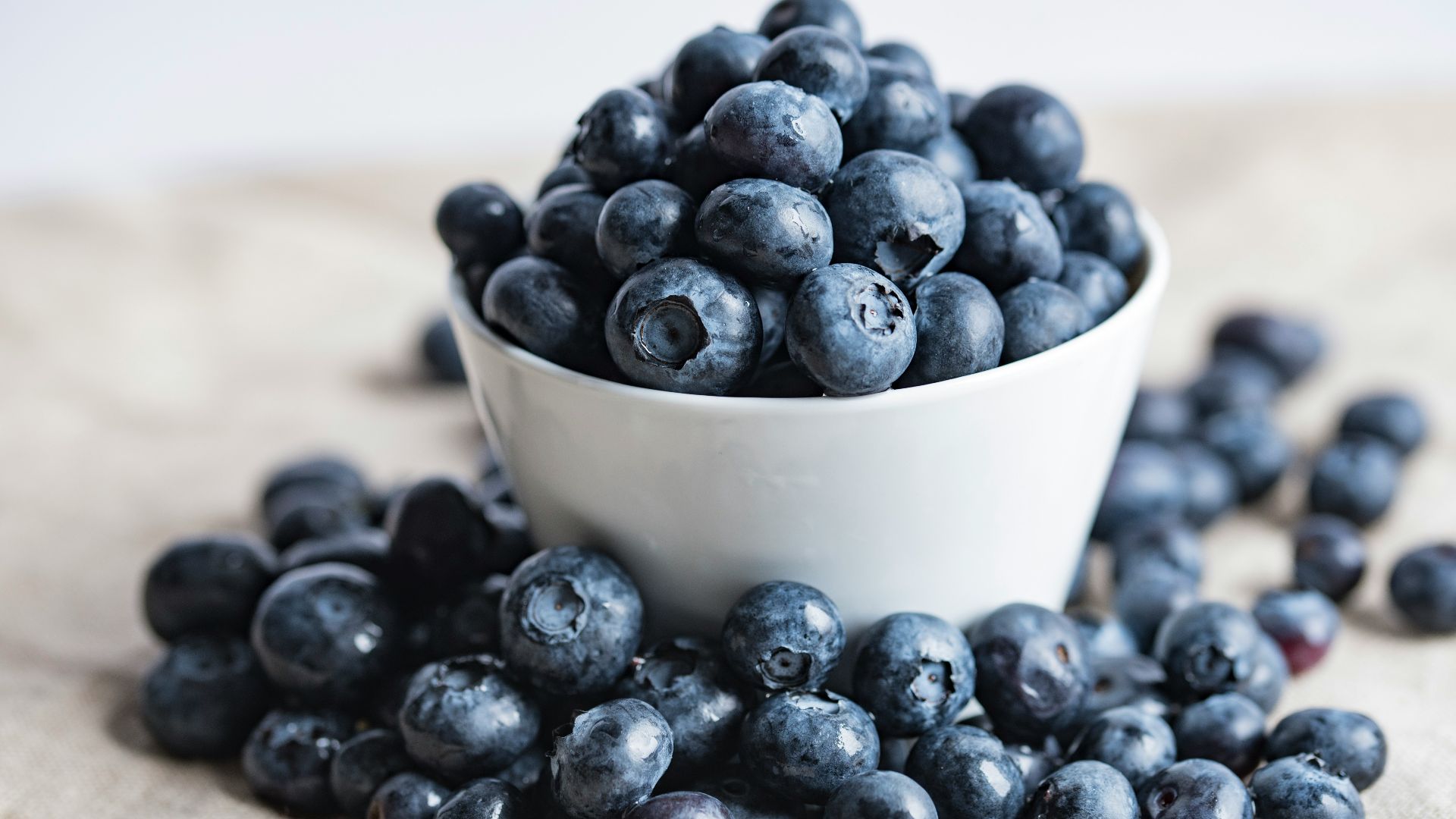 blueberries on white ceramic container