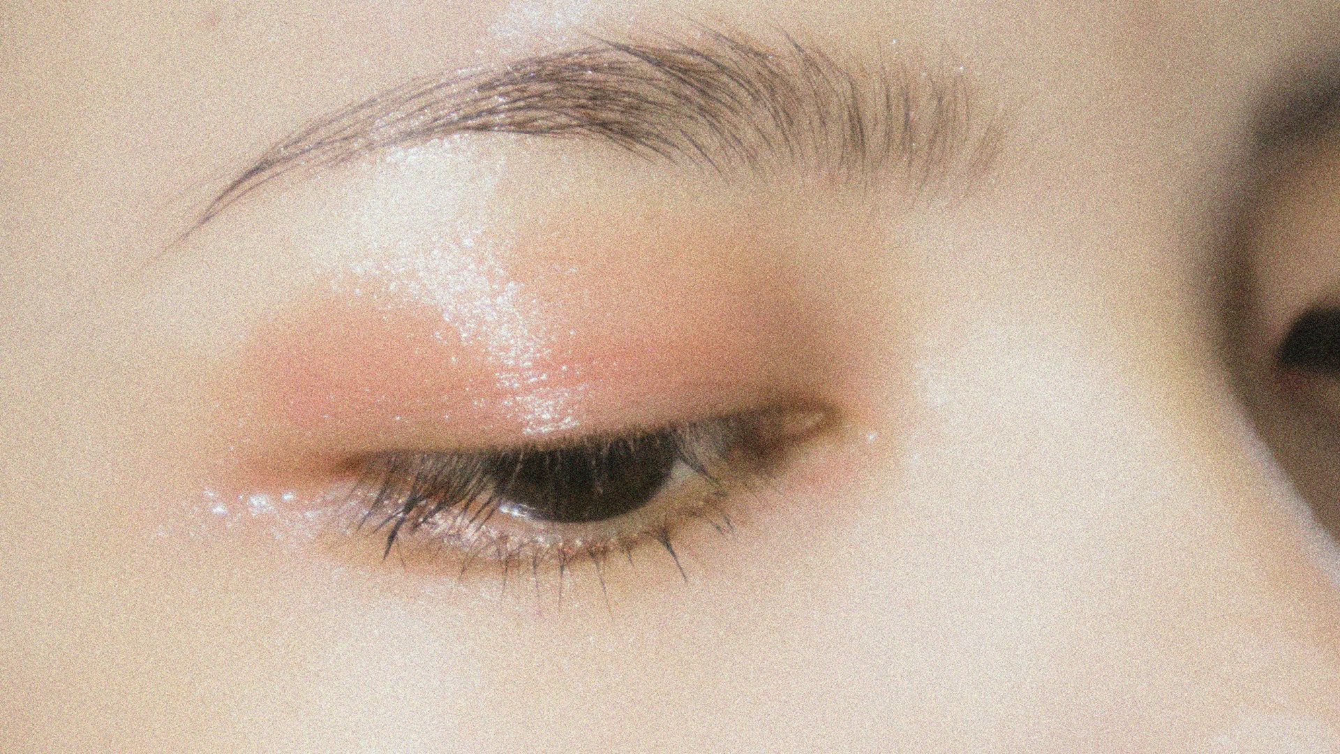 a close up of a woman's eye with makeup