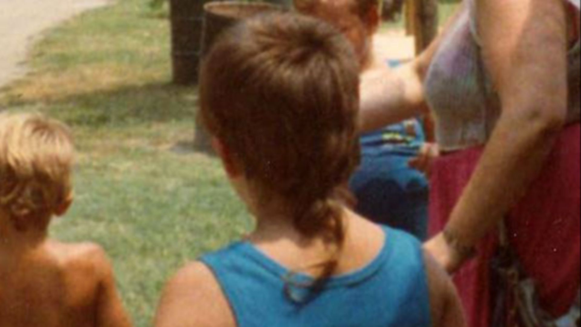File:Child in the 1980's with a rattail.jpg