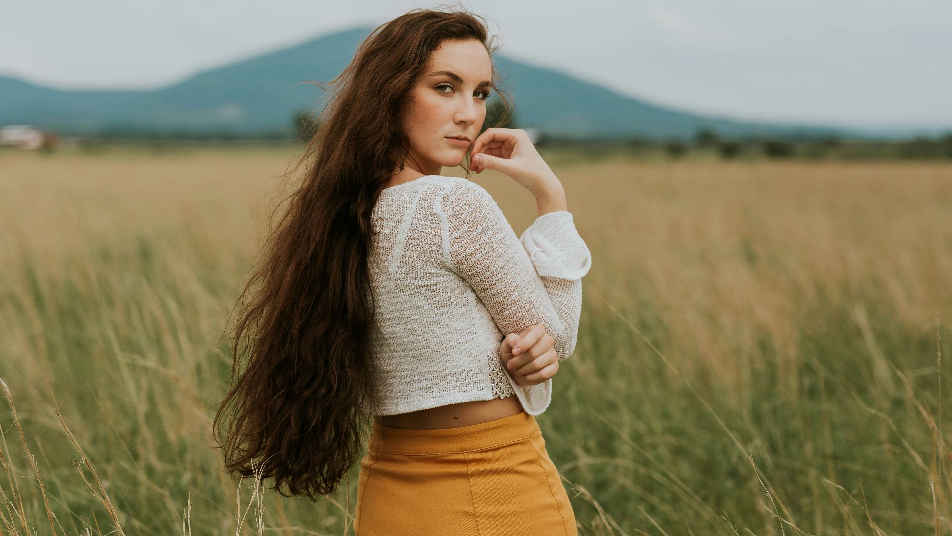 woman standing on grass field