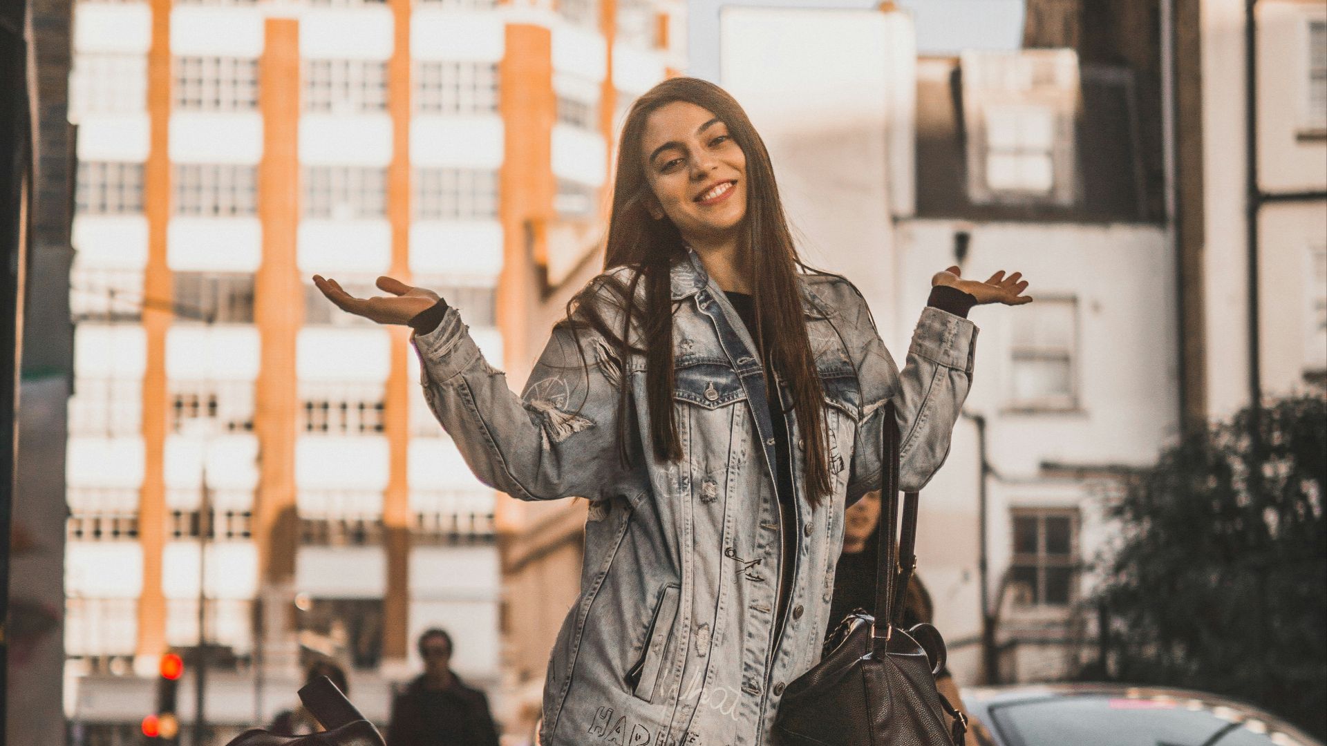 woman standing beside road