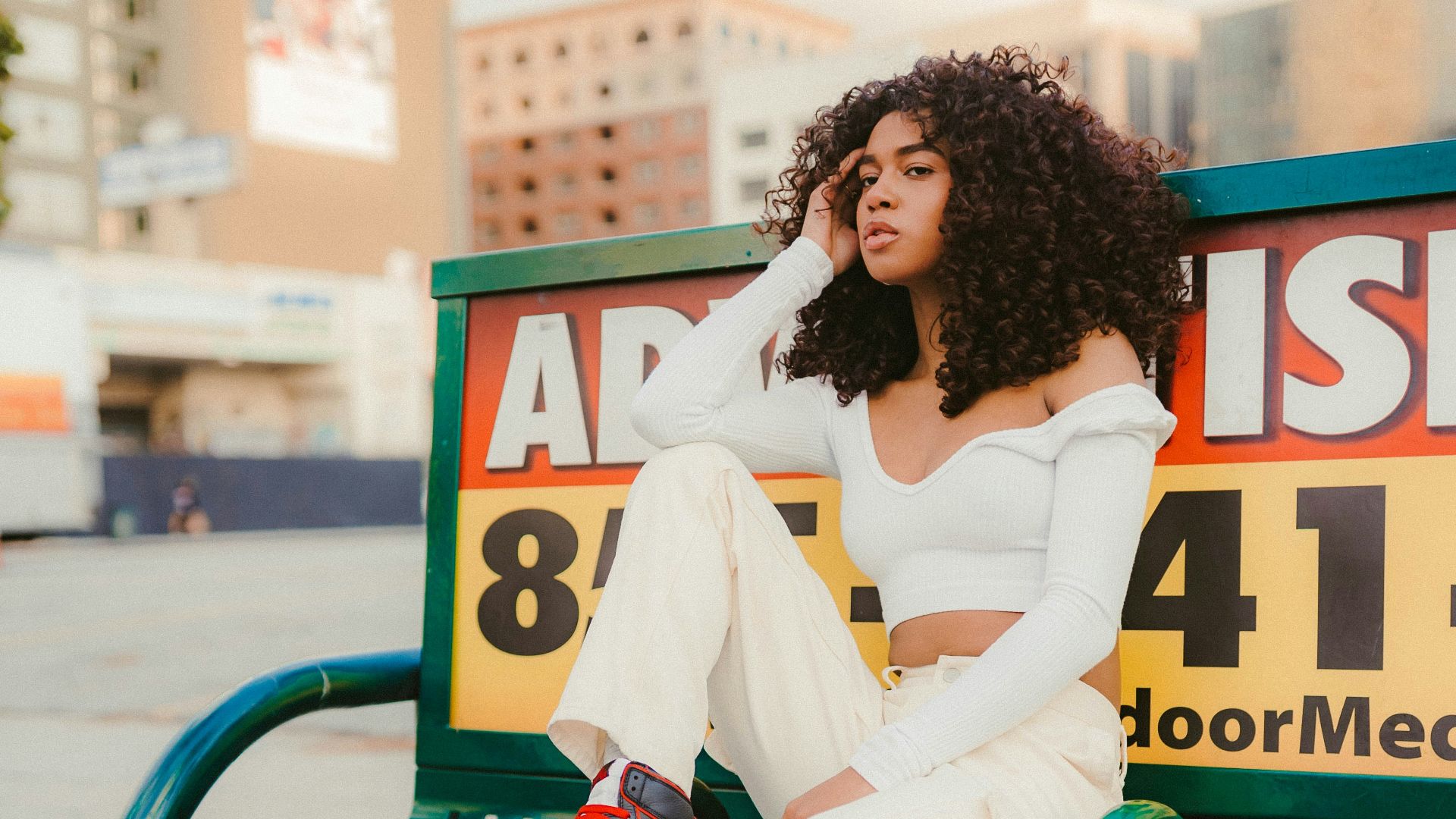 a person sitting on a bench