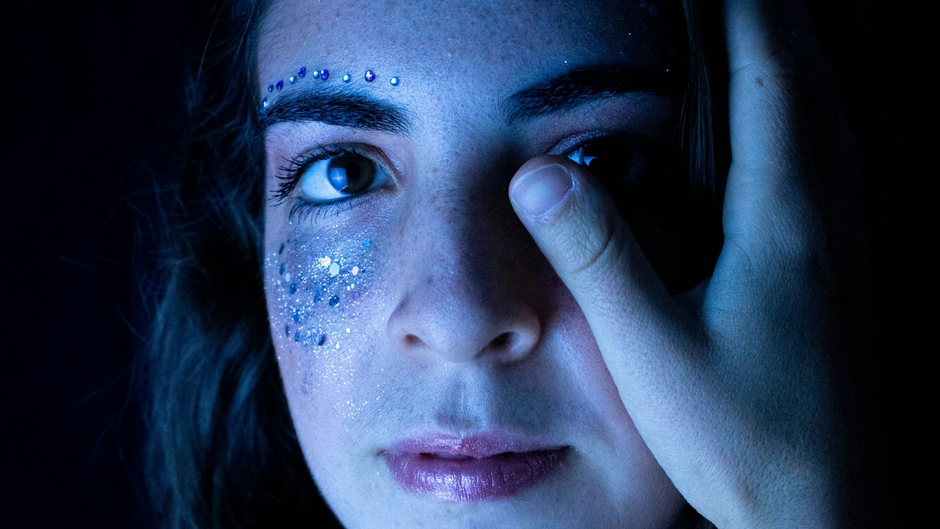 woman with blue eyes and black hair