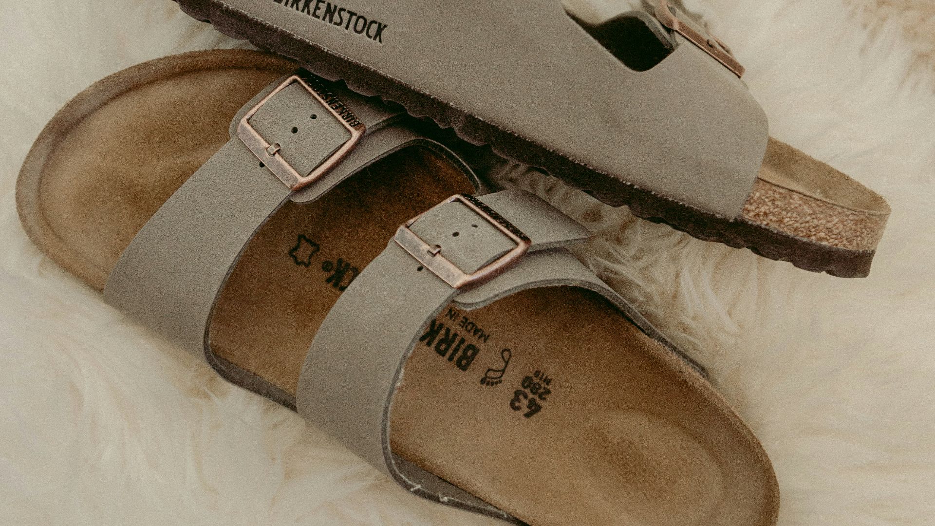 brown and gray slide sandals