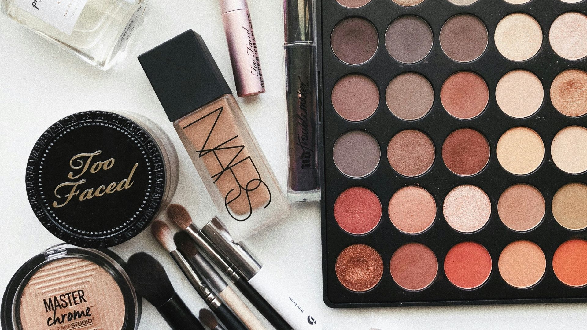 close-up photography of assorted cosmetics