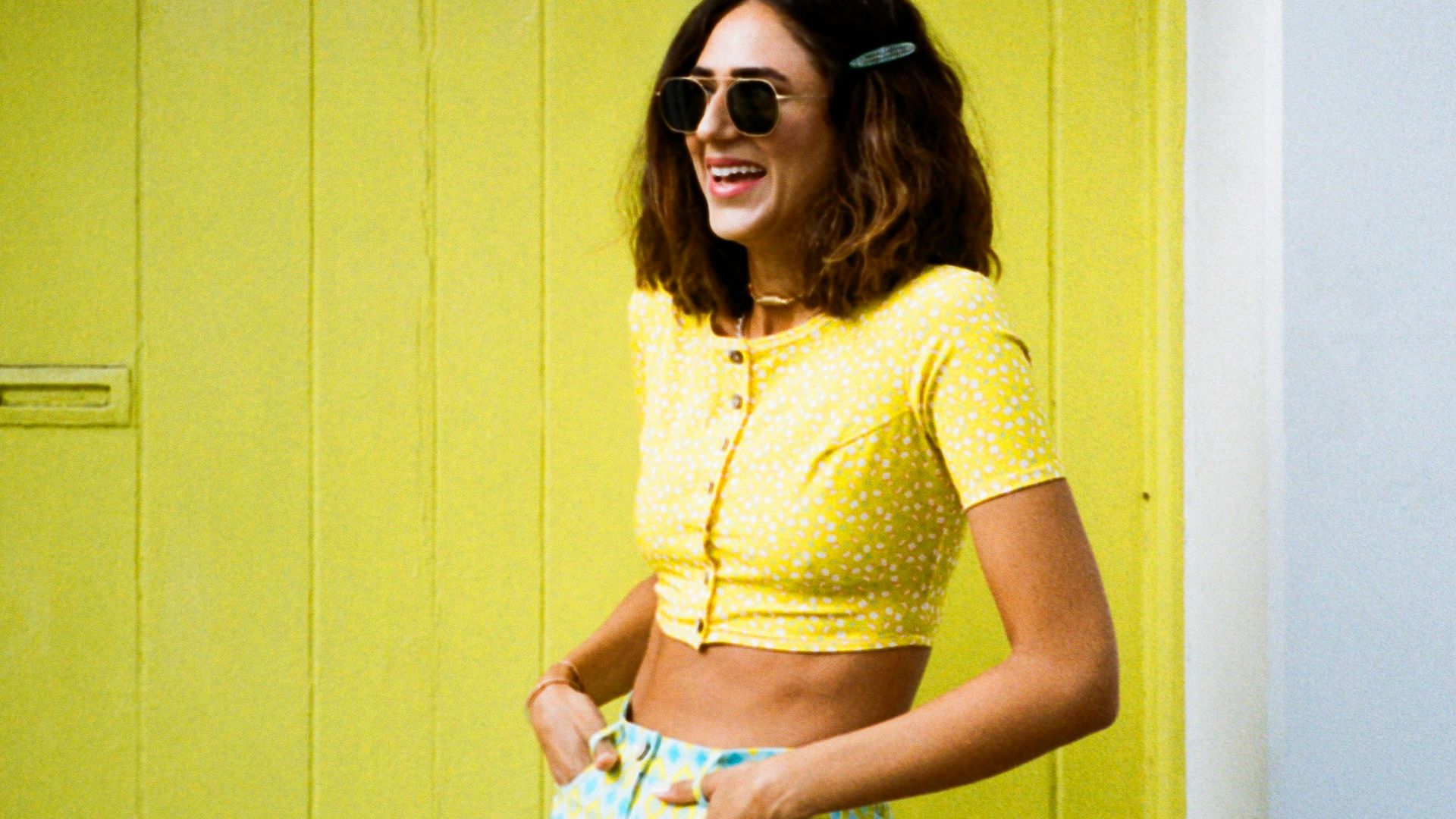 a woman in a yellow shirt