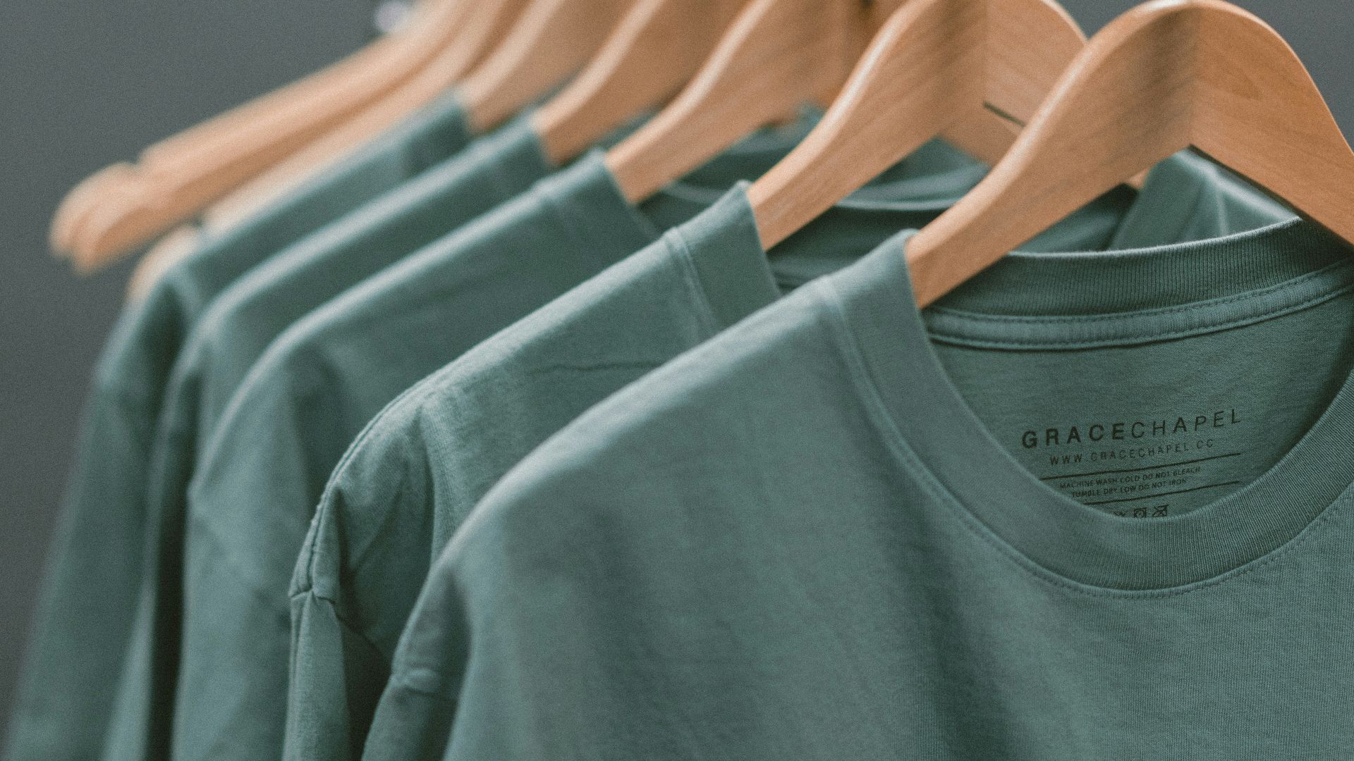 photo of blue crew-neck tops