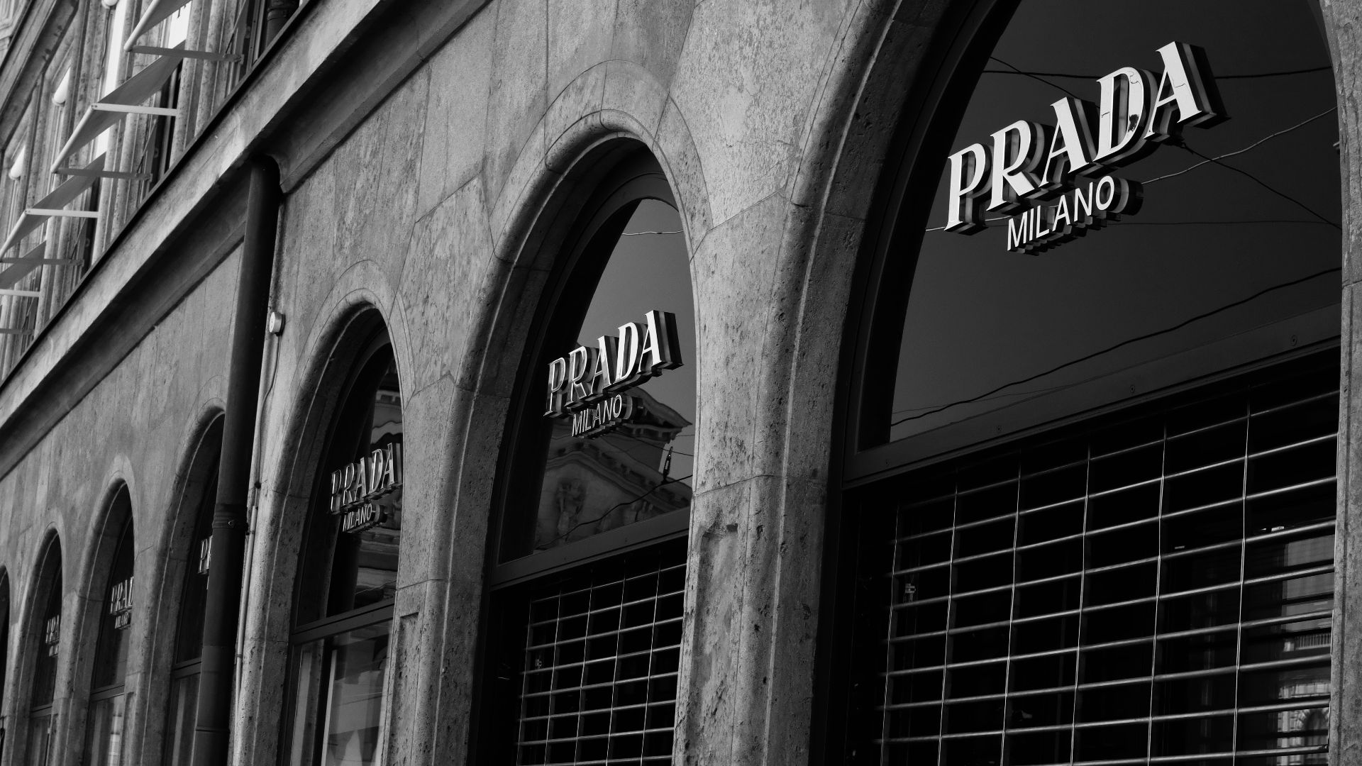 a building with windows and a sign on the side