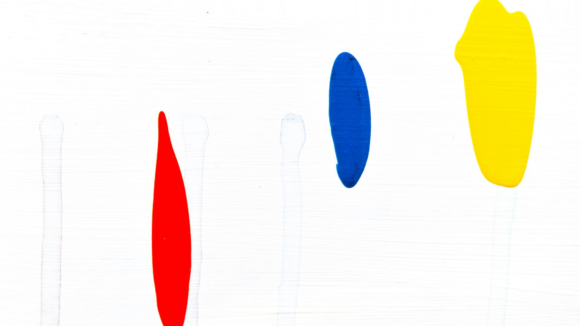 red, blue, and yellow paints graphic