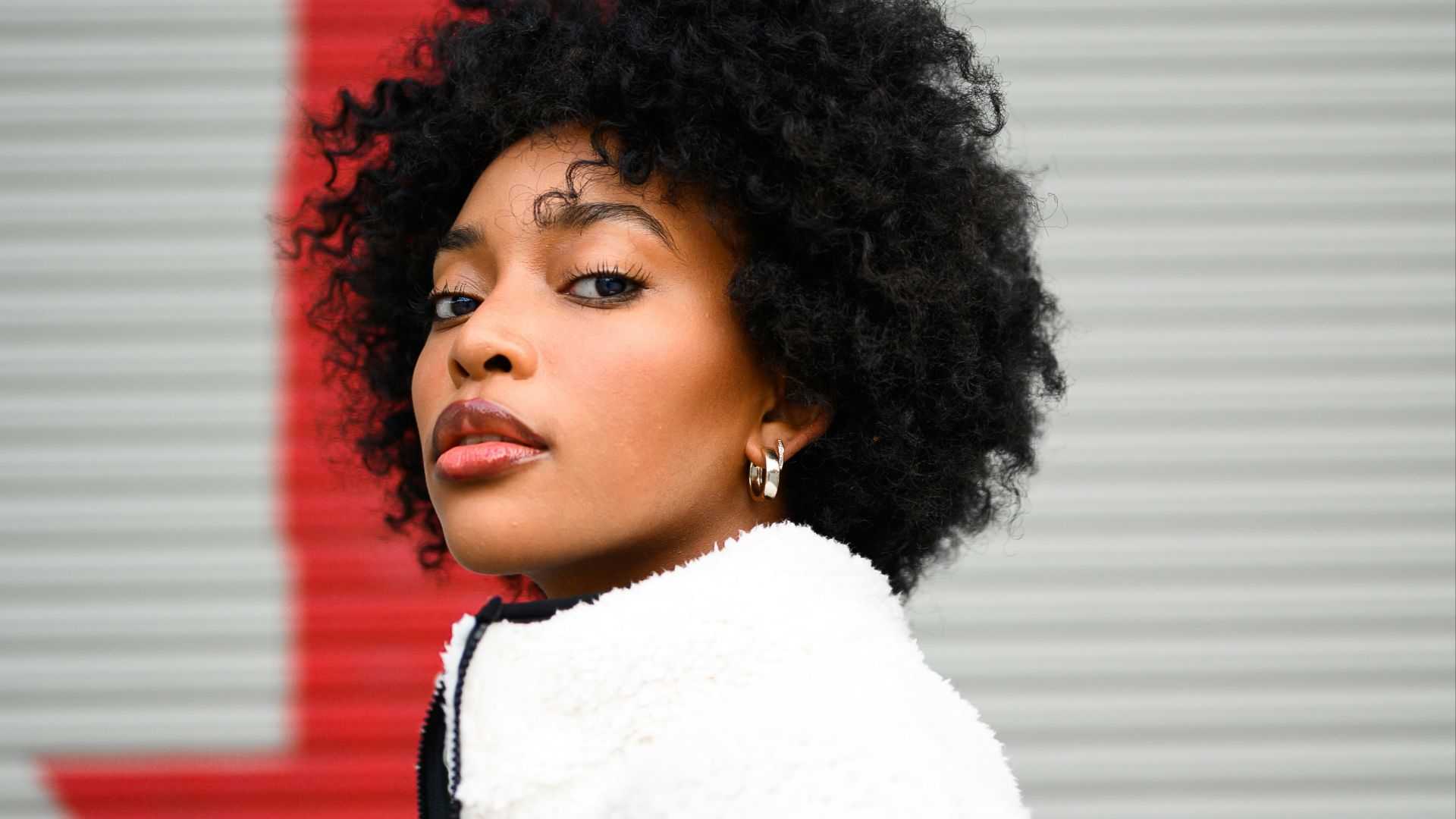 woman in white and red shirt