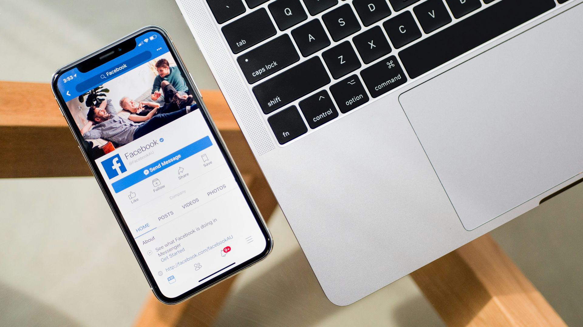 iPhone X beside MacBook