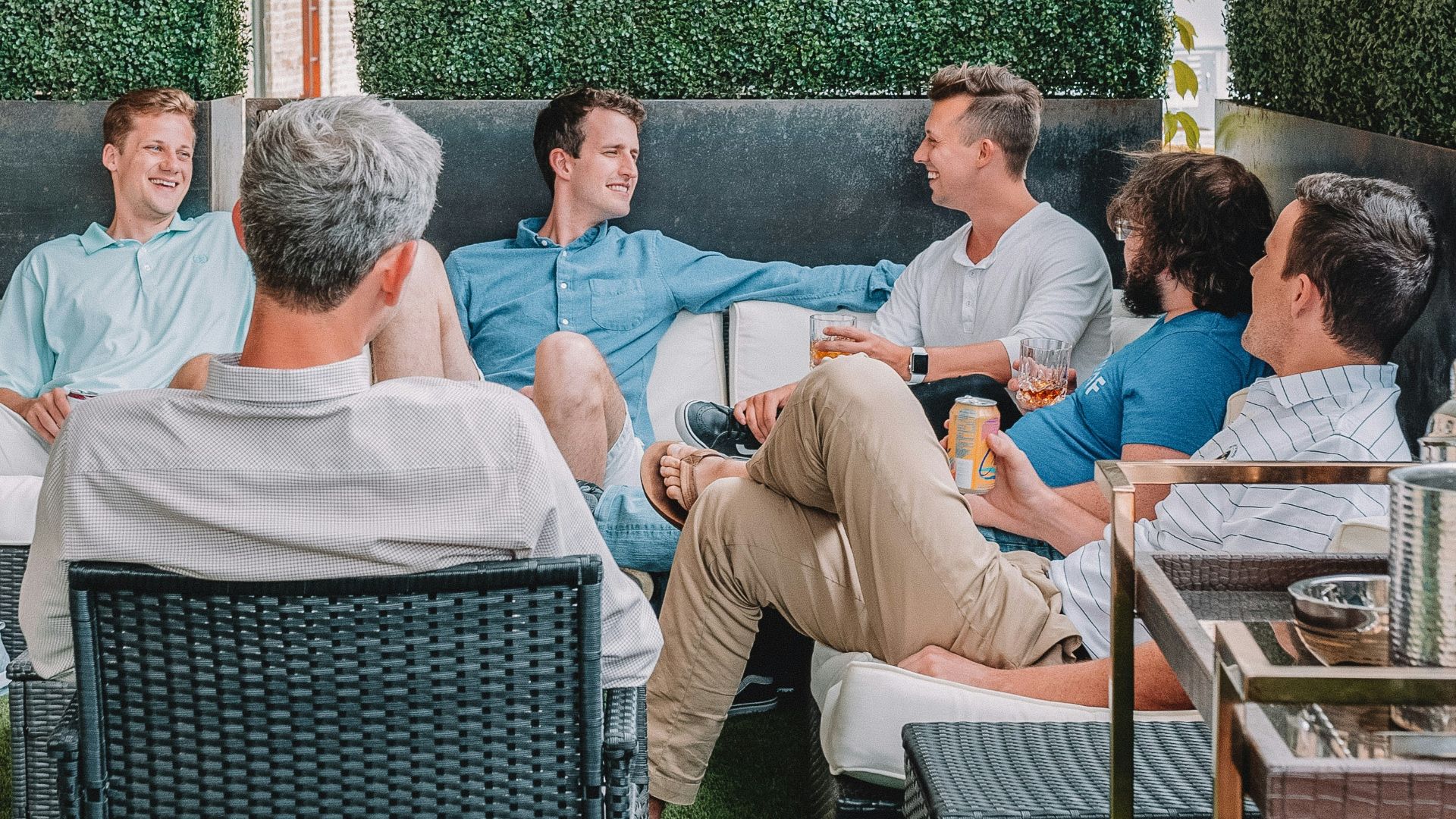 men sitting on chairs