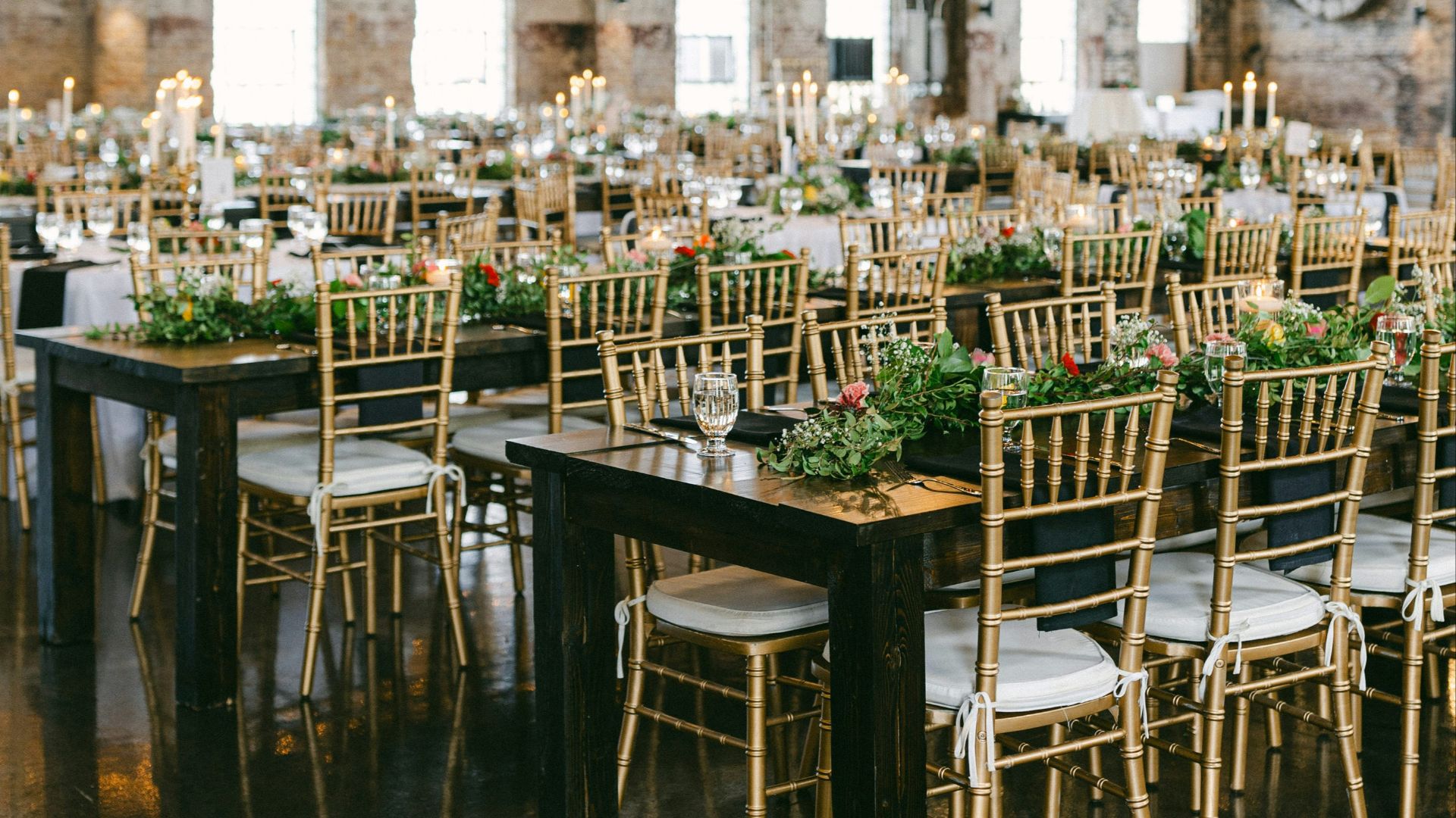 A large room filled with lots of tables and chairs
