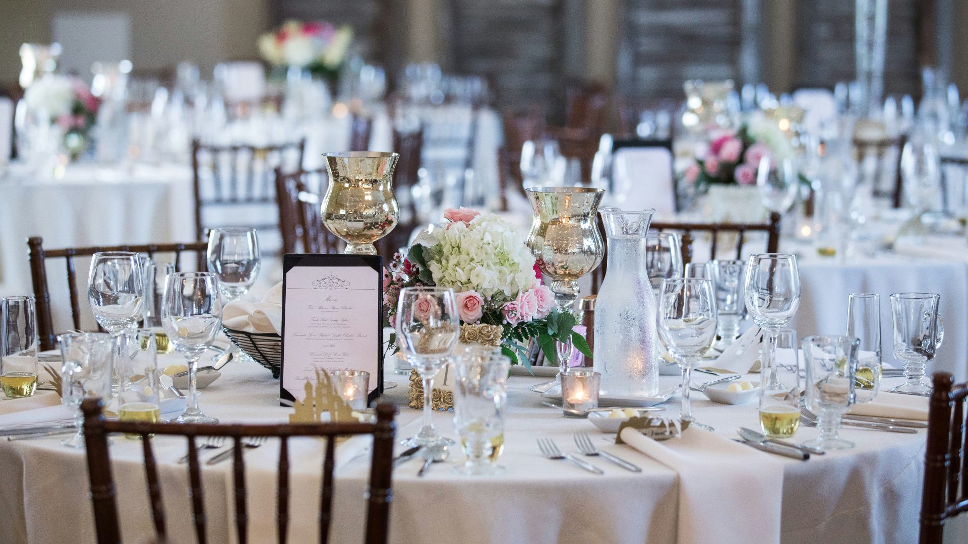 a table is set up for a formal dinner