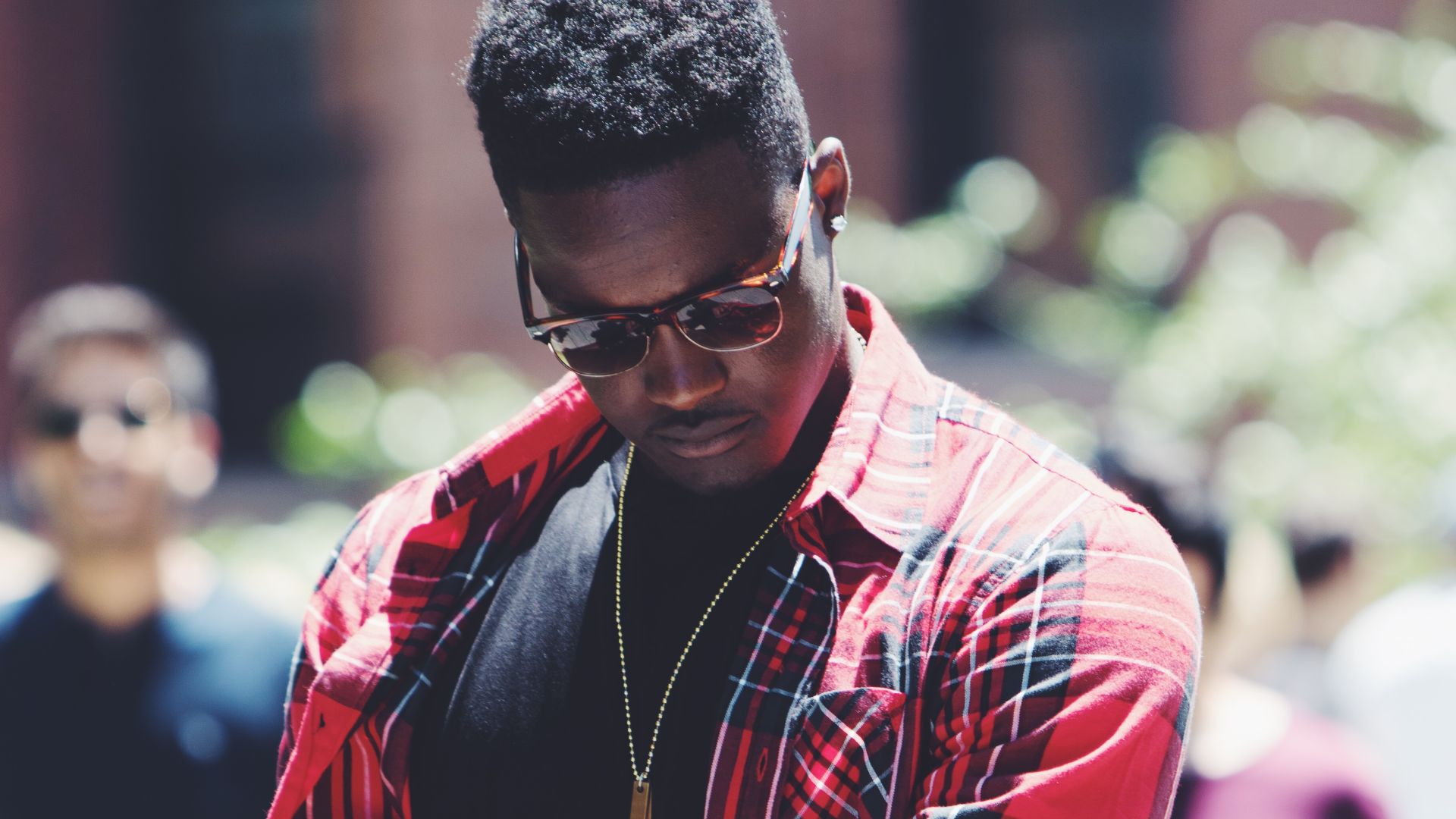 File:Man rolling sleeves (Unsplash).jpg