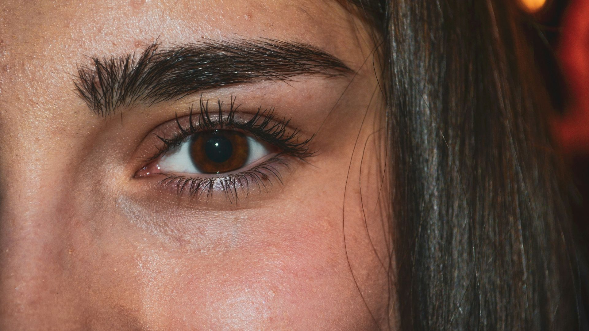 woman with black hair and blue eyes