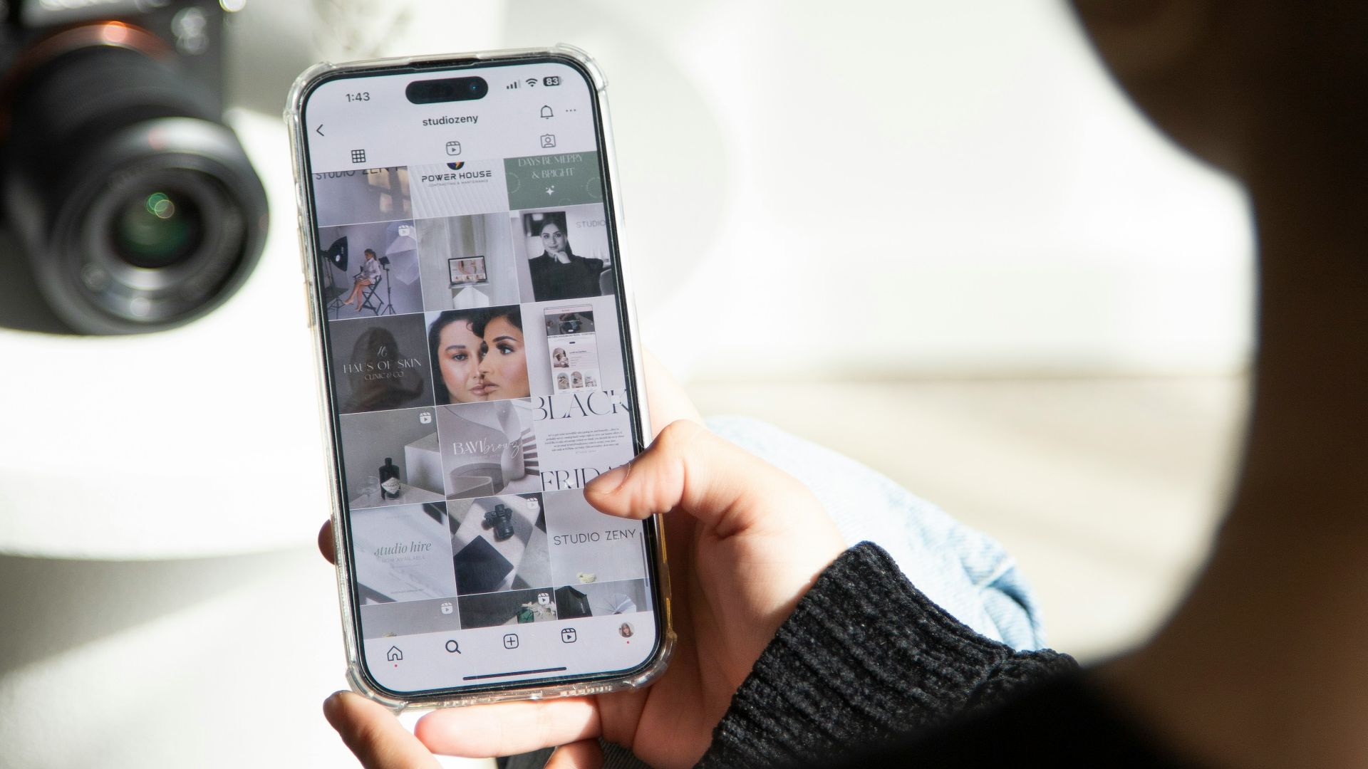 a person holding up a cell phone with pictures on it