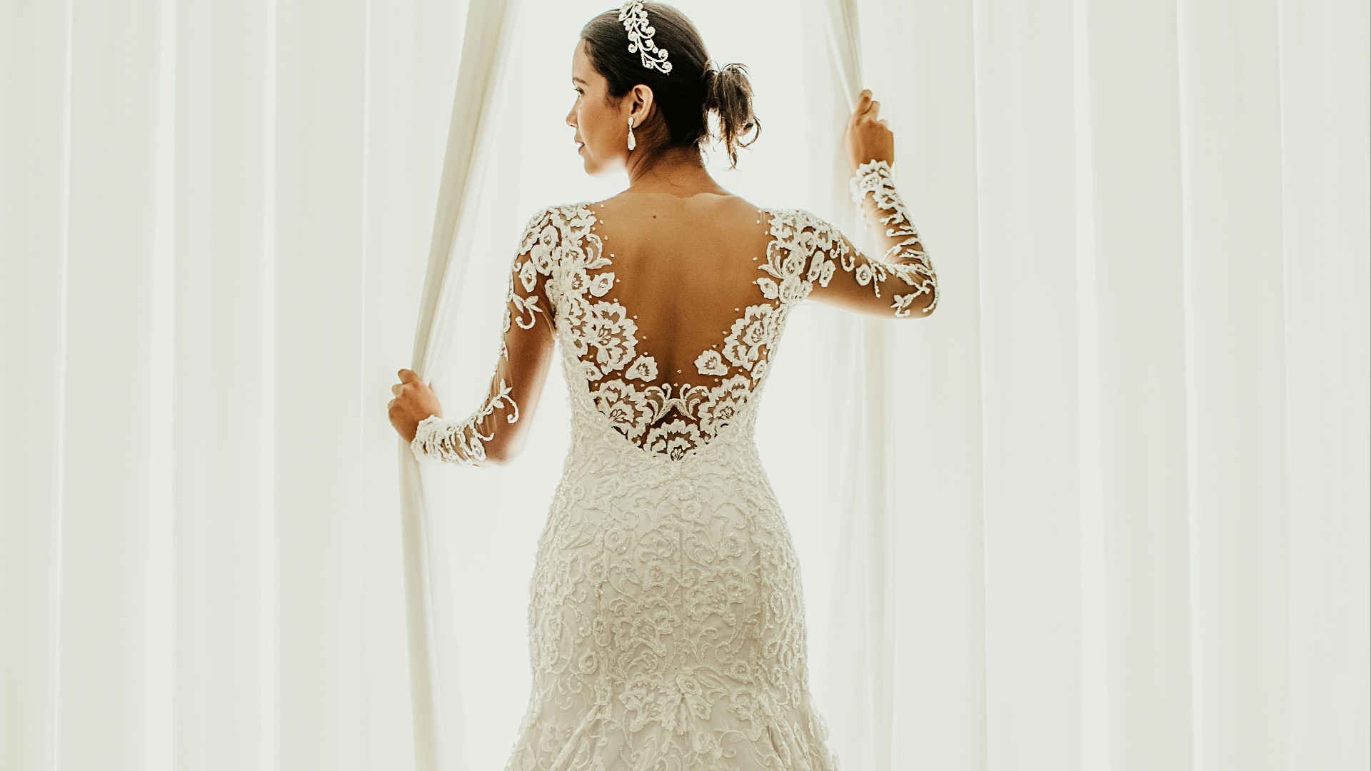 woman in white floral wedding dress