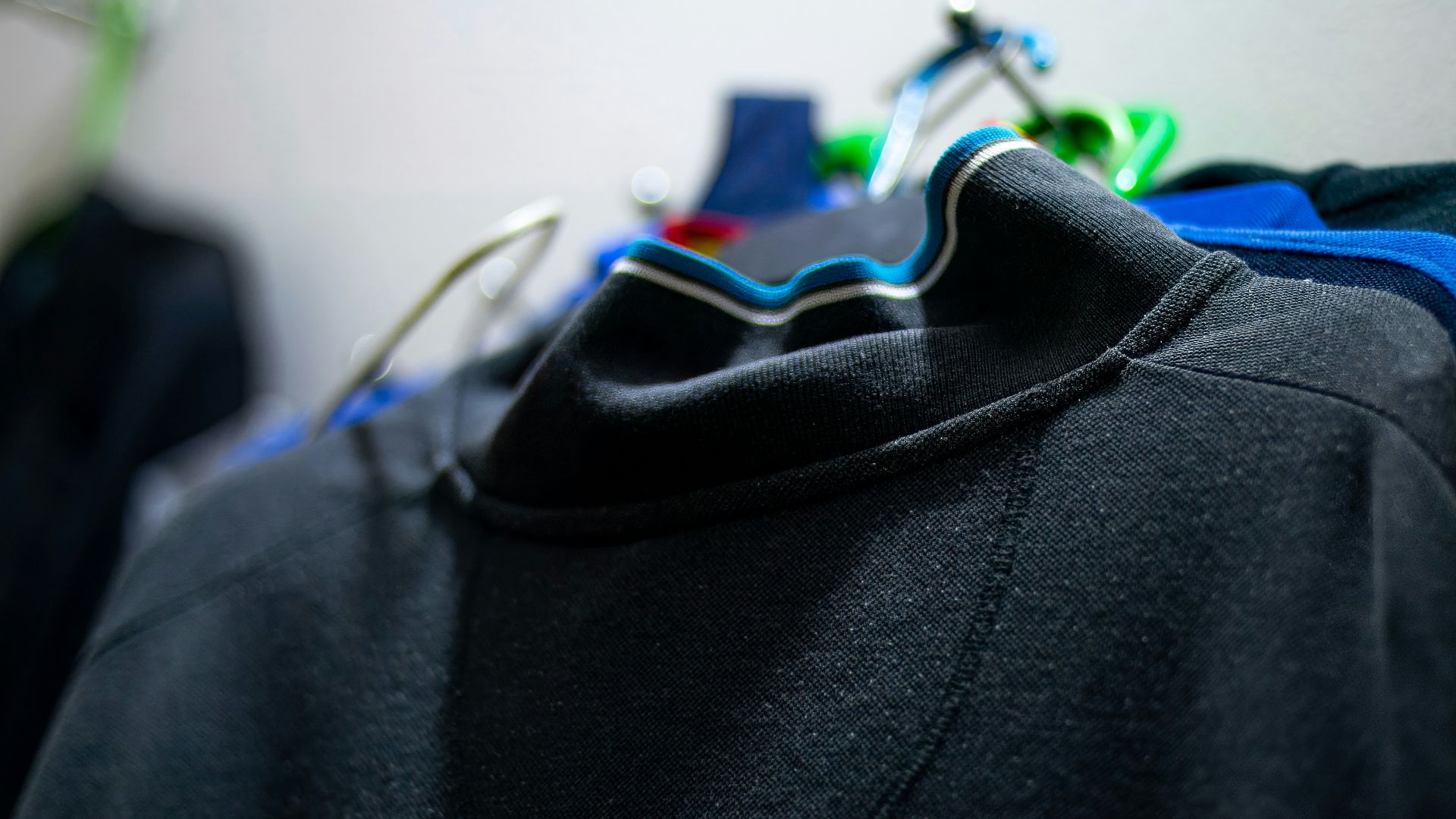 Clothes hanging on a rack inside.