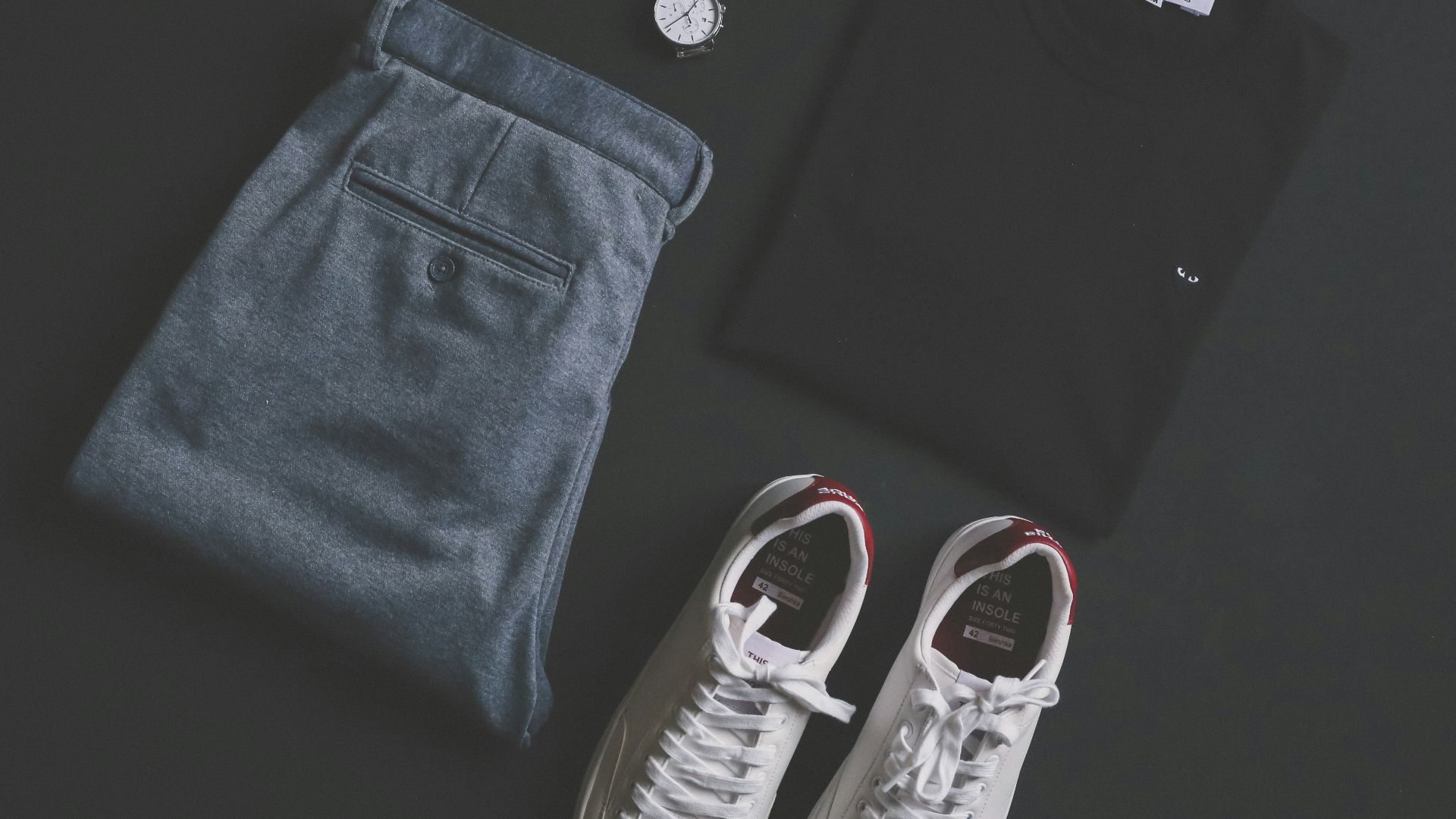 pair of white low-top sneakers