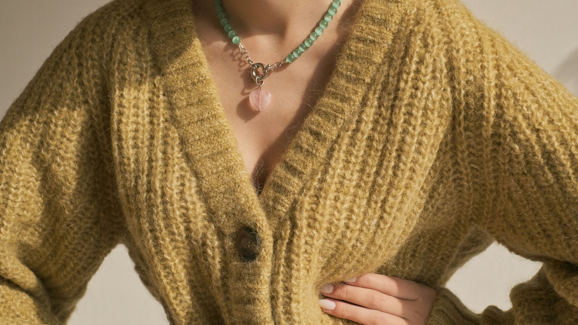 woman in yellow knit cardigan