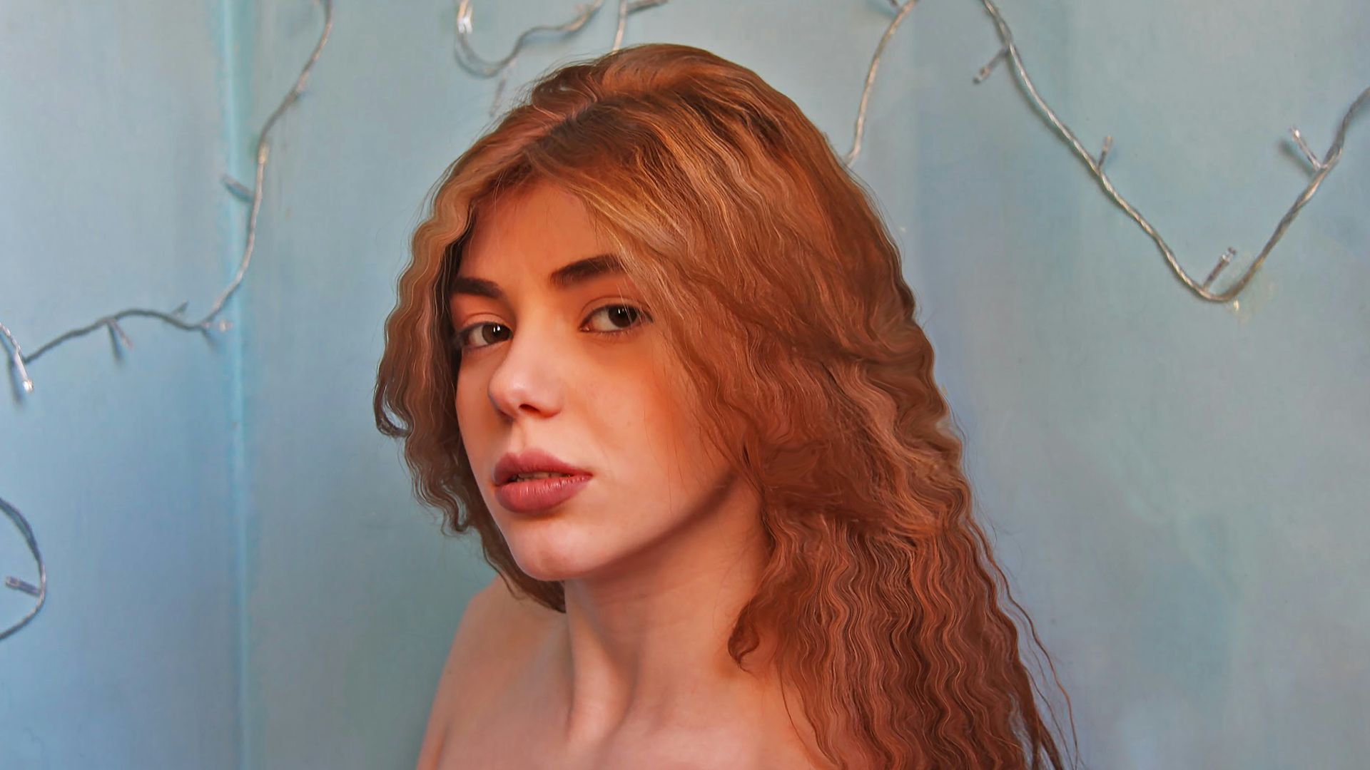 topless woman with brown hair