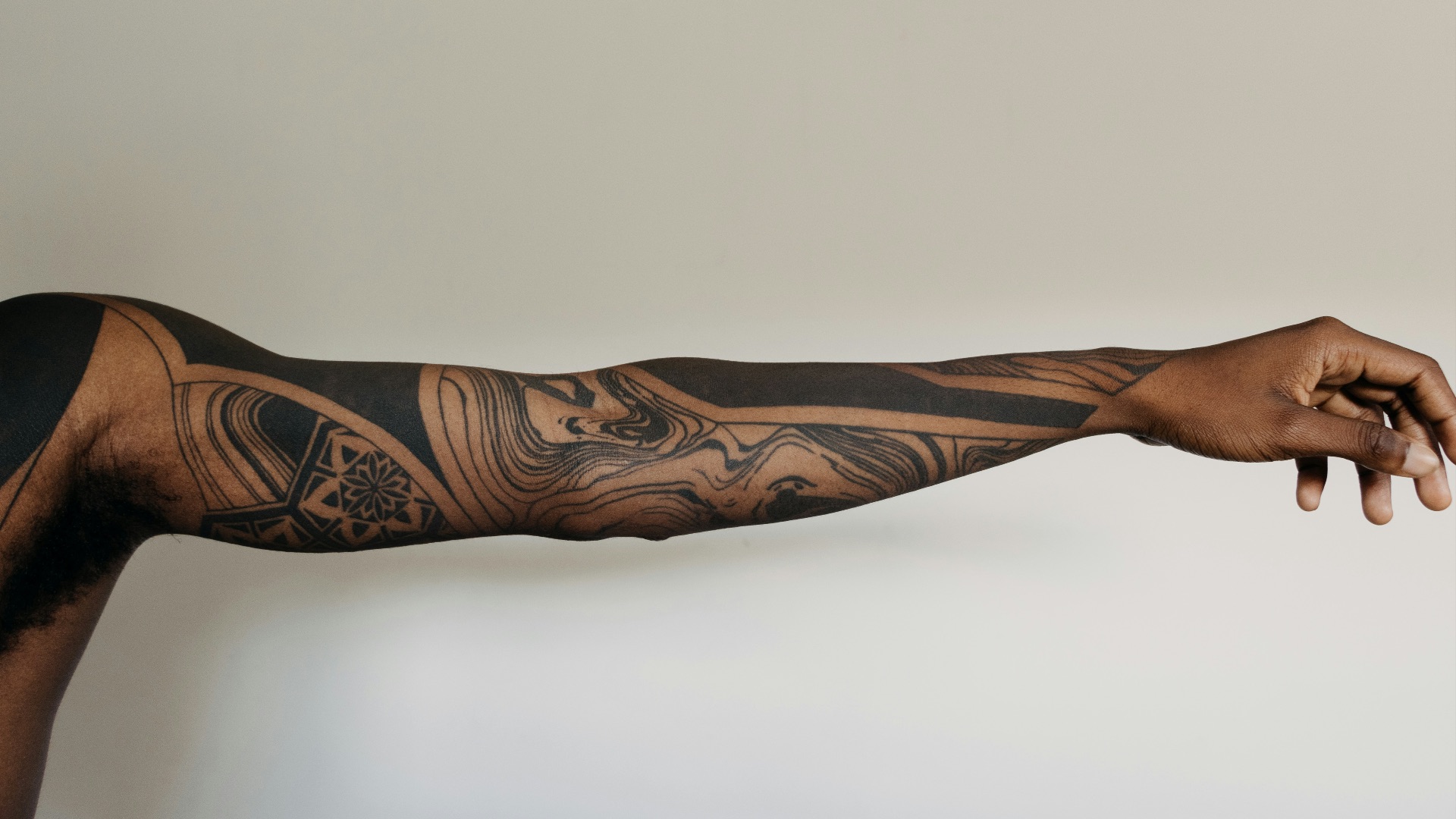 black and brown tribal tattoo