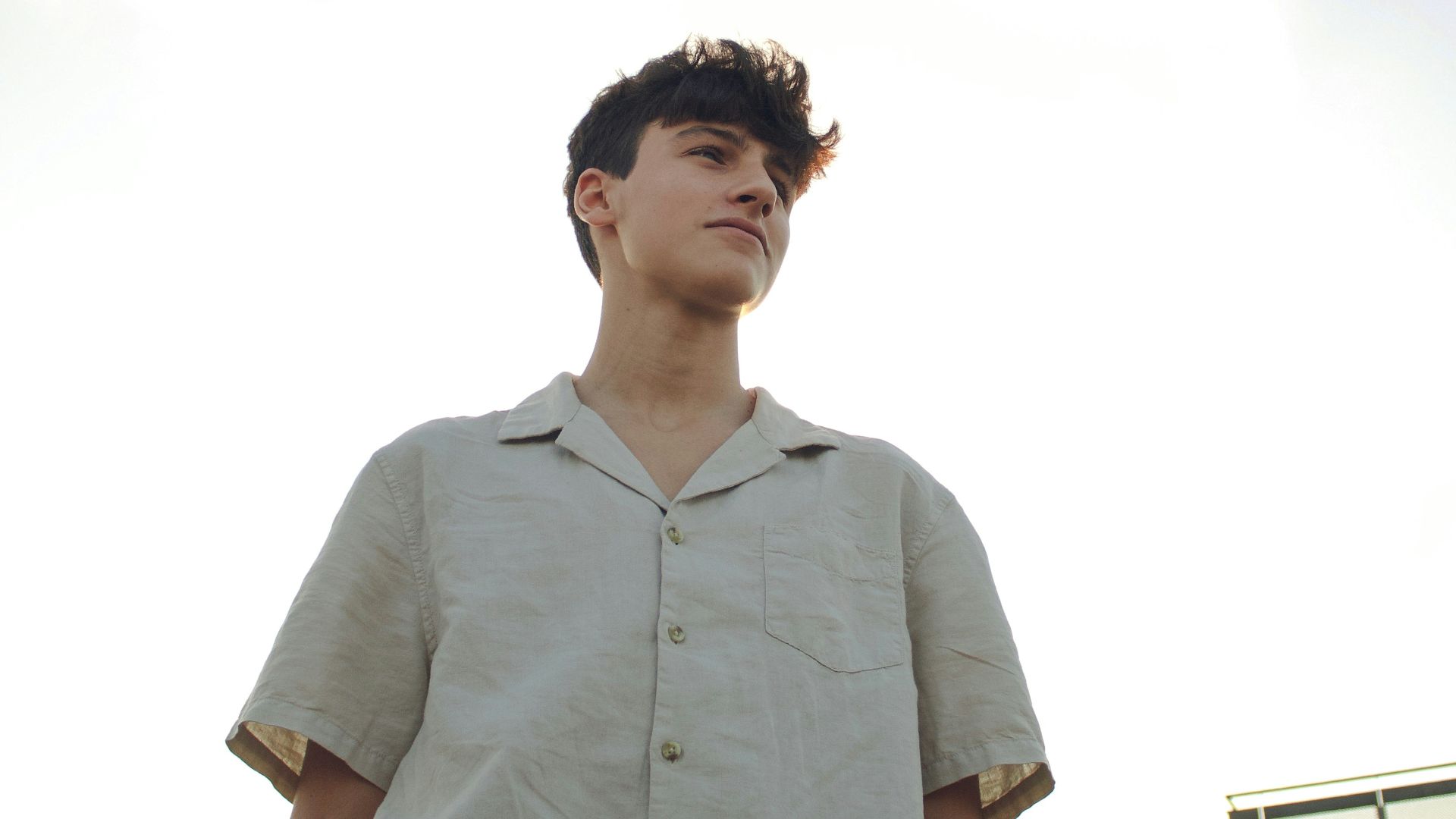 man in white button up shirt standing during daytime