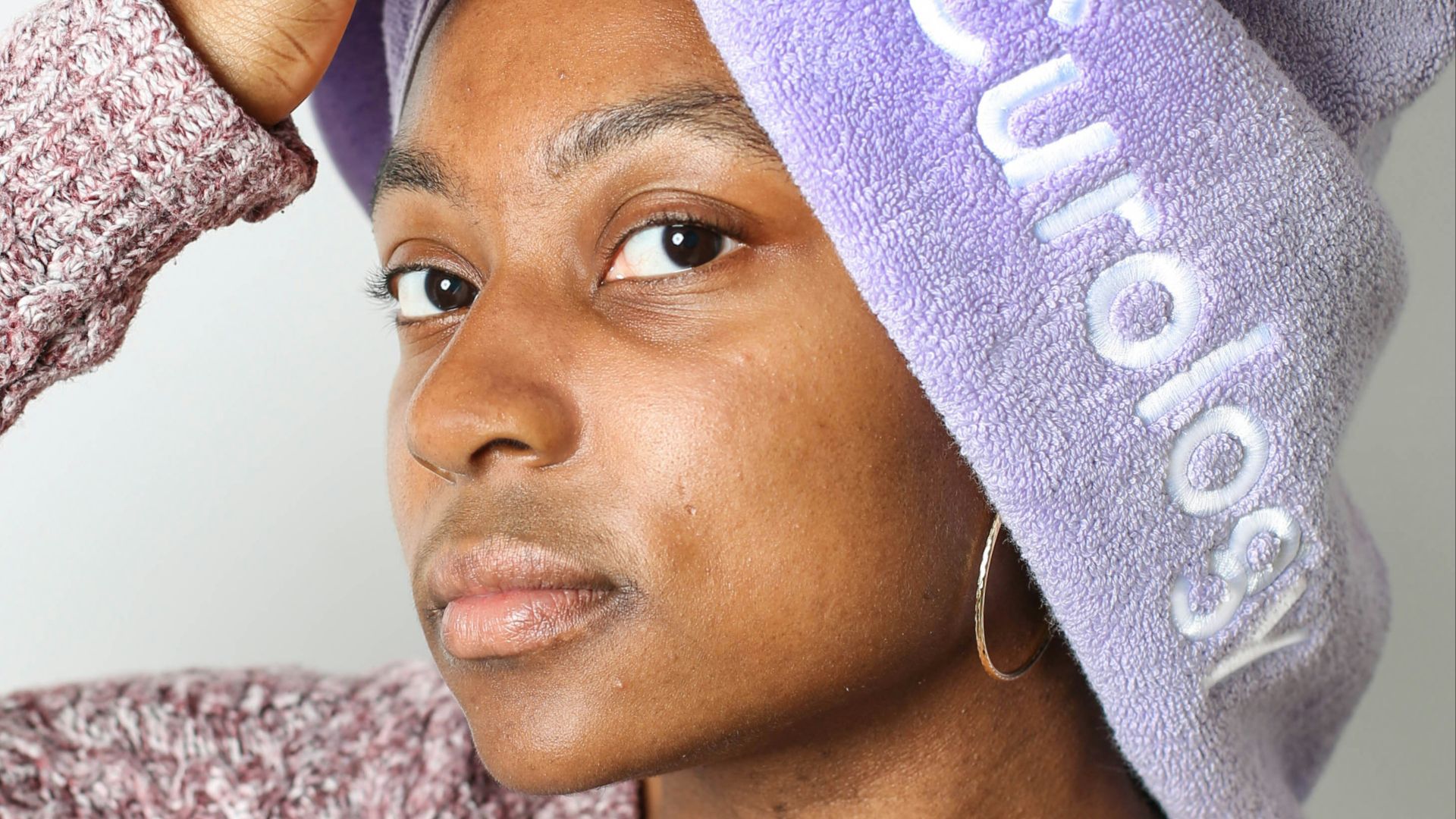 woman in brown and white floral long-sleeved shirt