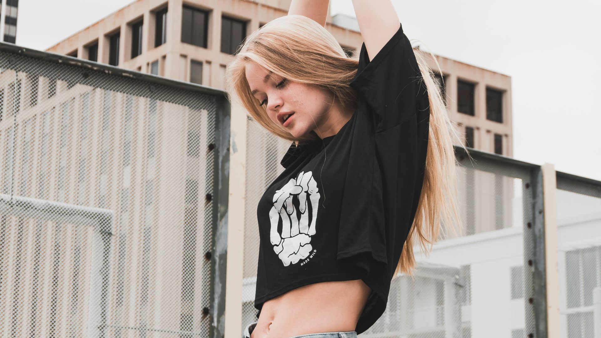 woman stretching her arm upward