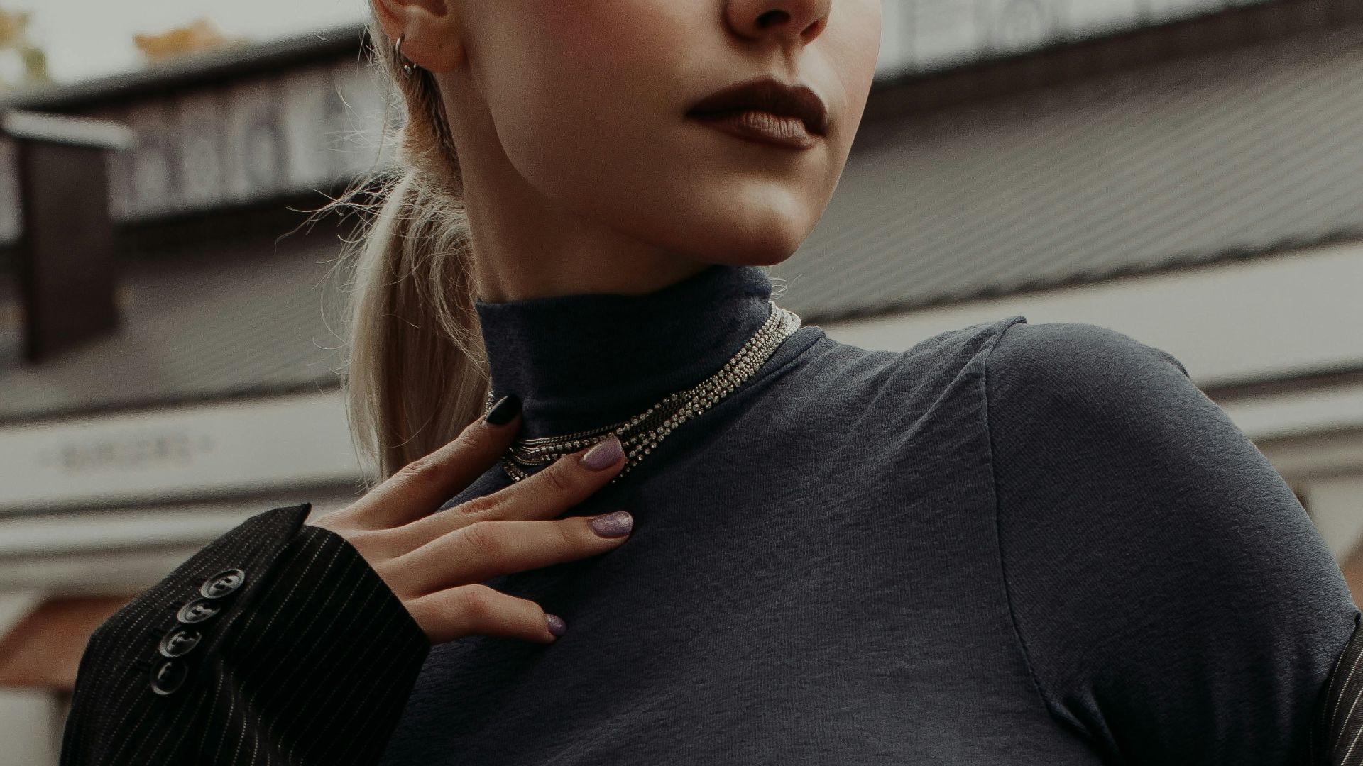 woman in black long sleeve shirt and black cardigan