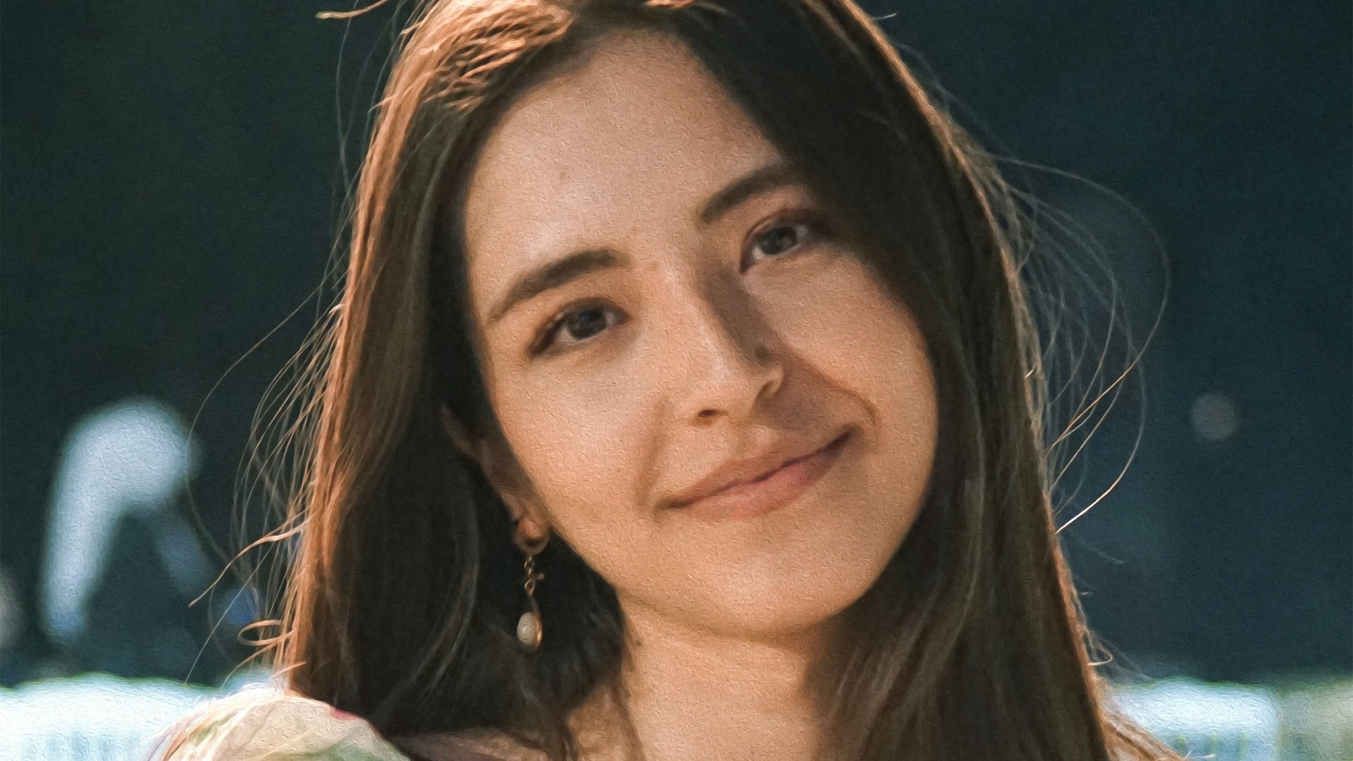 a woman sitting on a white chair next to a table