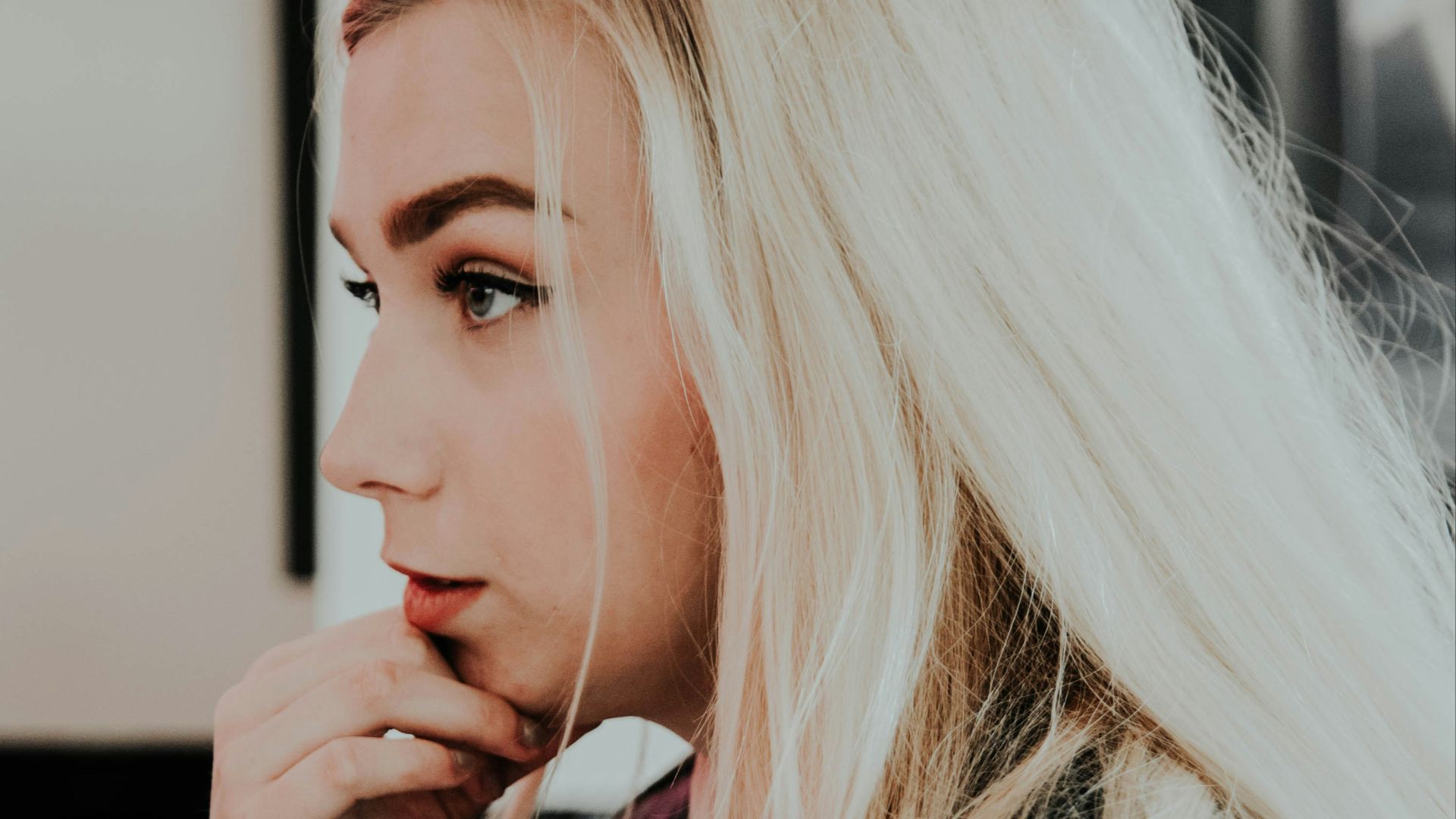 beige hair woman wearing black jacket