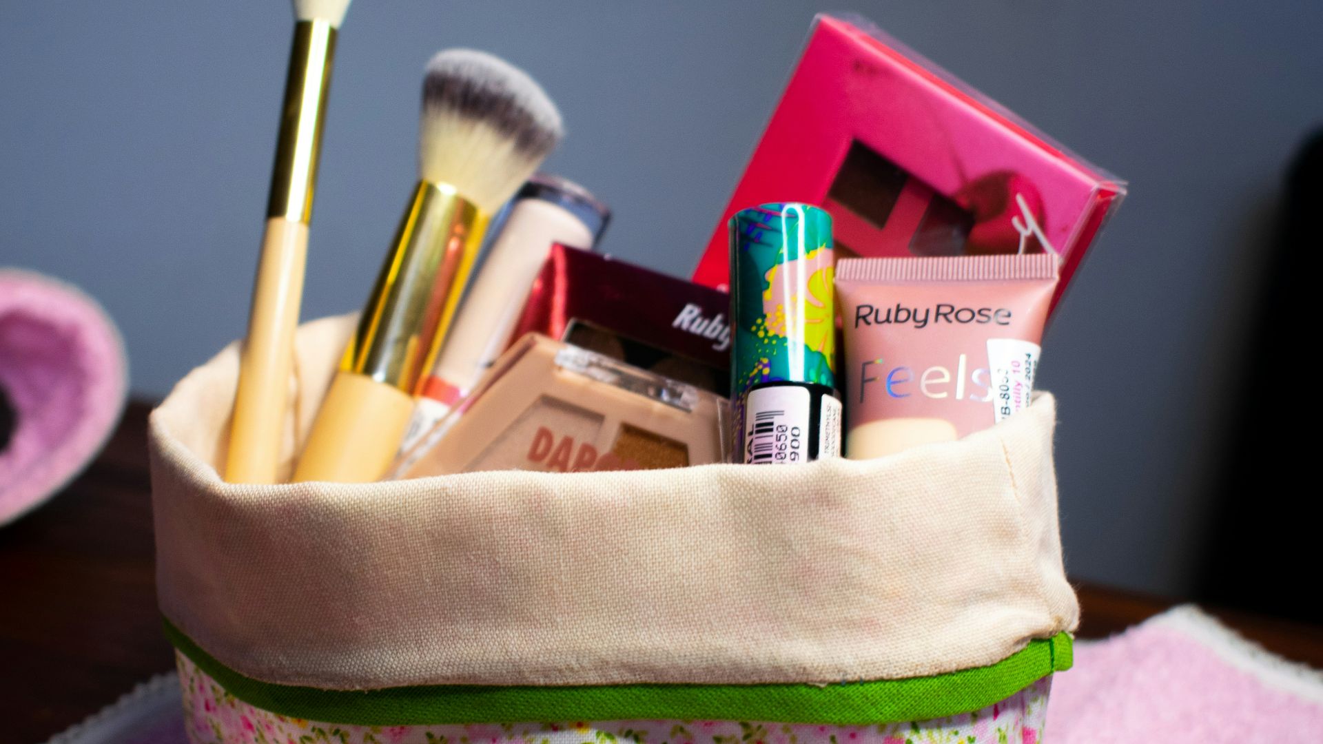 a purse with makeup and other items in it