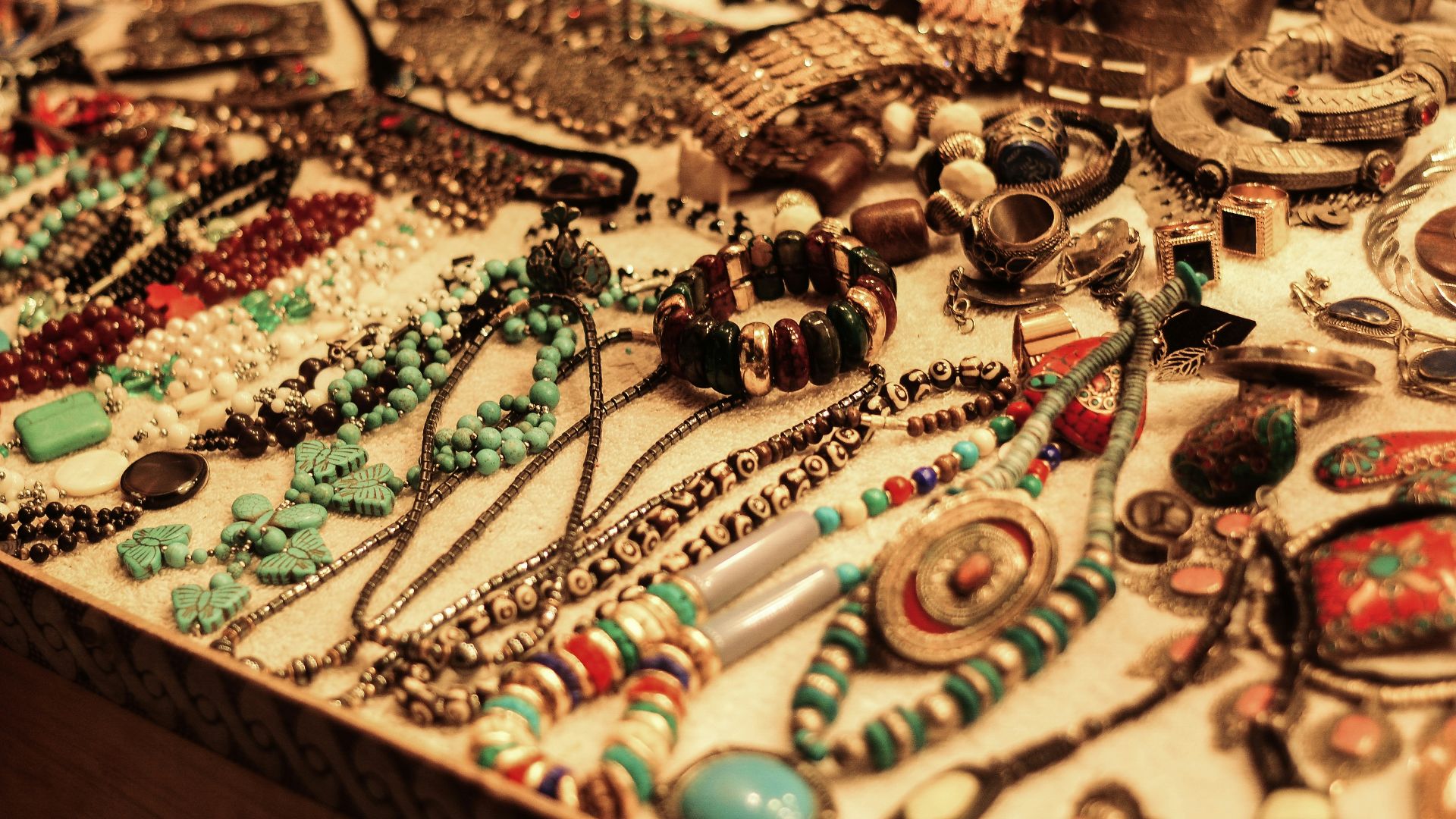 jewelries on white table