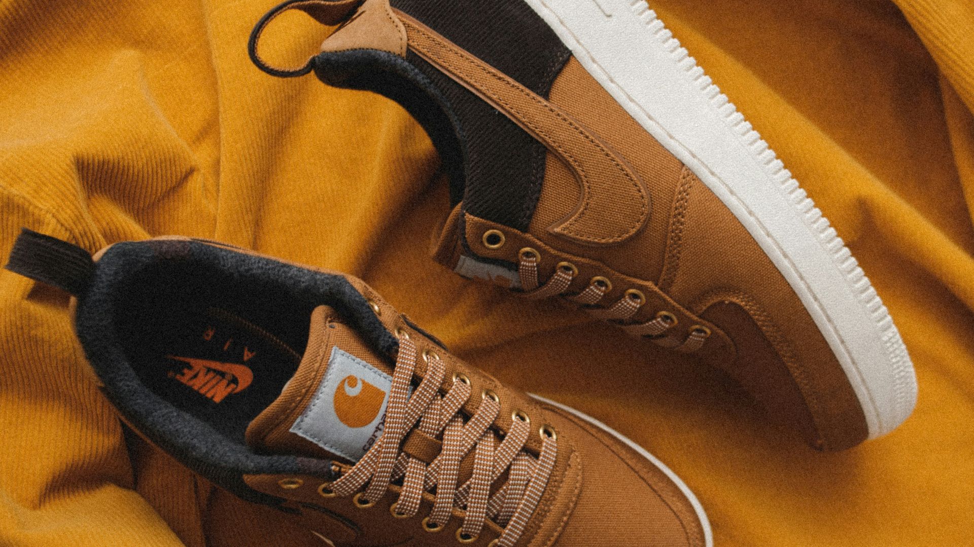 pair of Carhartt x Nike Air Force 1 shoes
