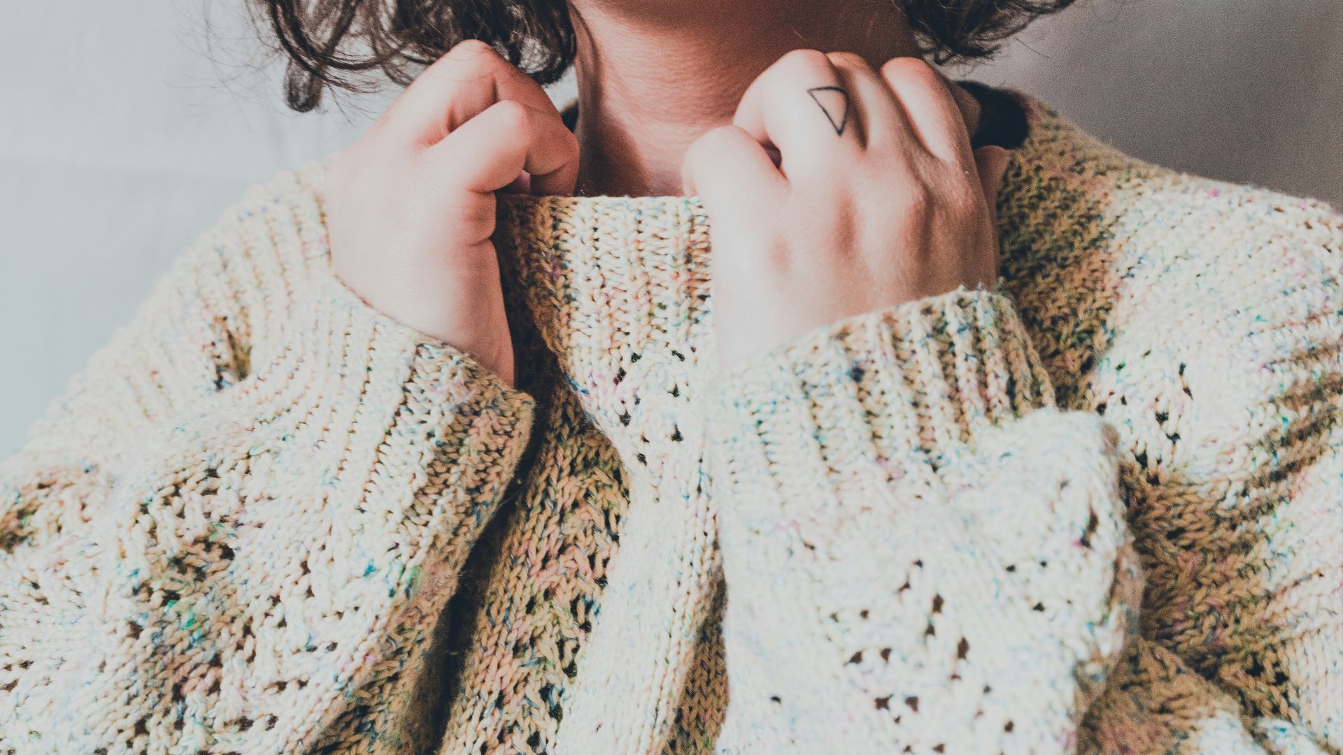 woman in white knit sweater