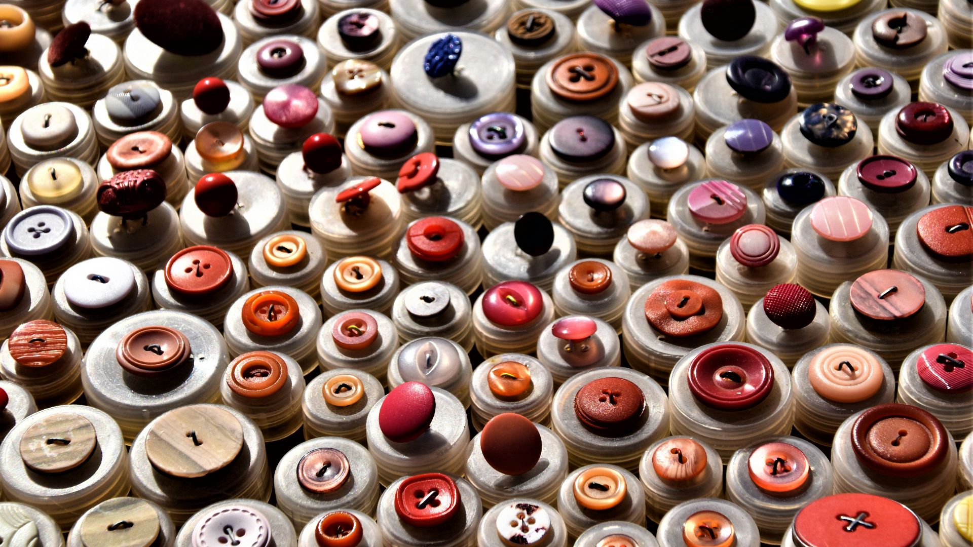 assorted-colored clothes buttons